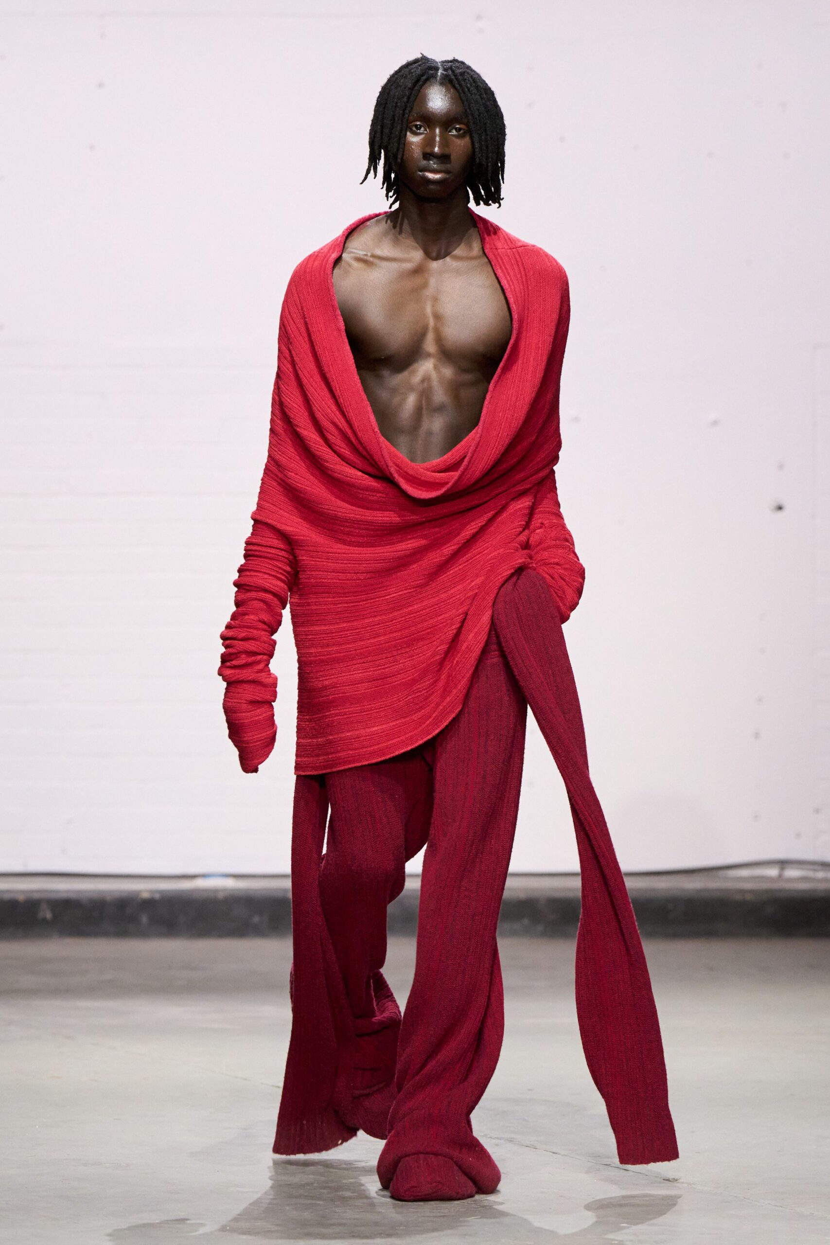 red knit long-sleeve v-neck relaxed draped top