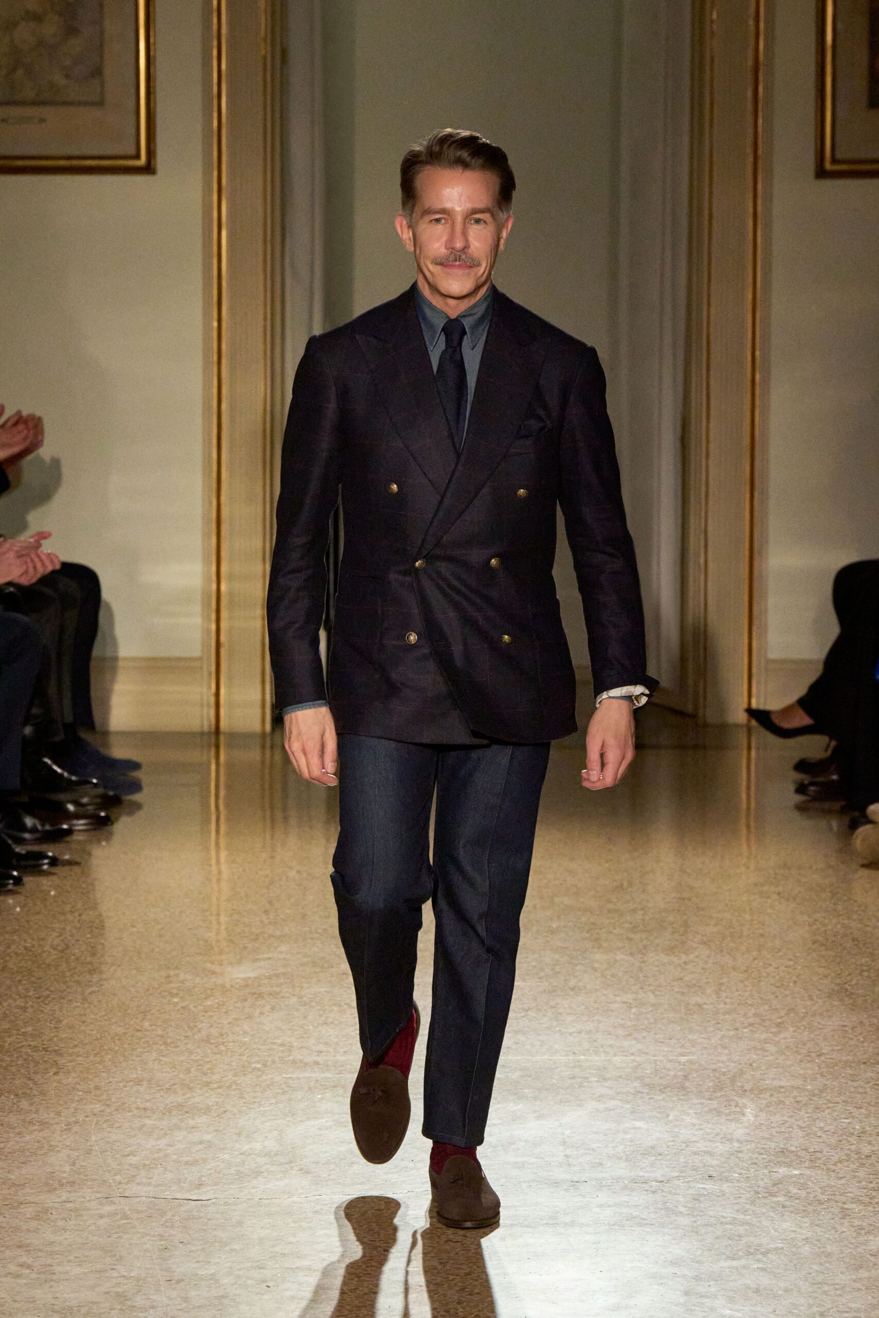 blue tailored suit with brown shoes