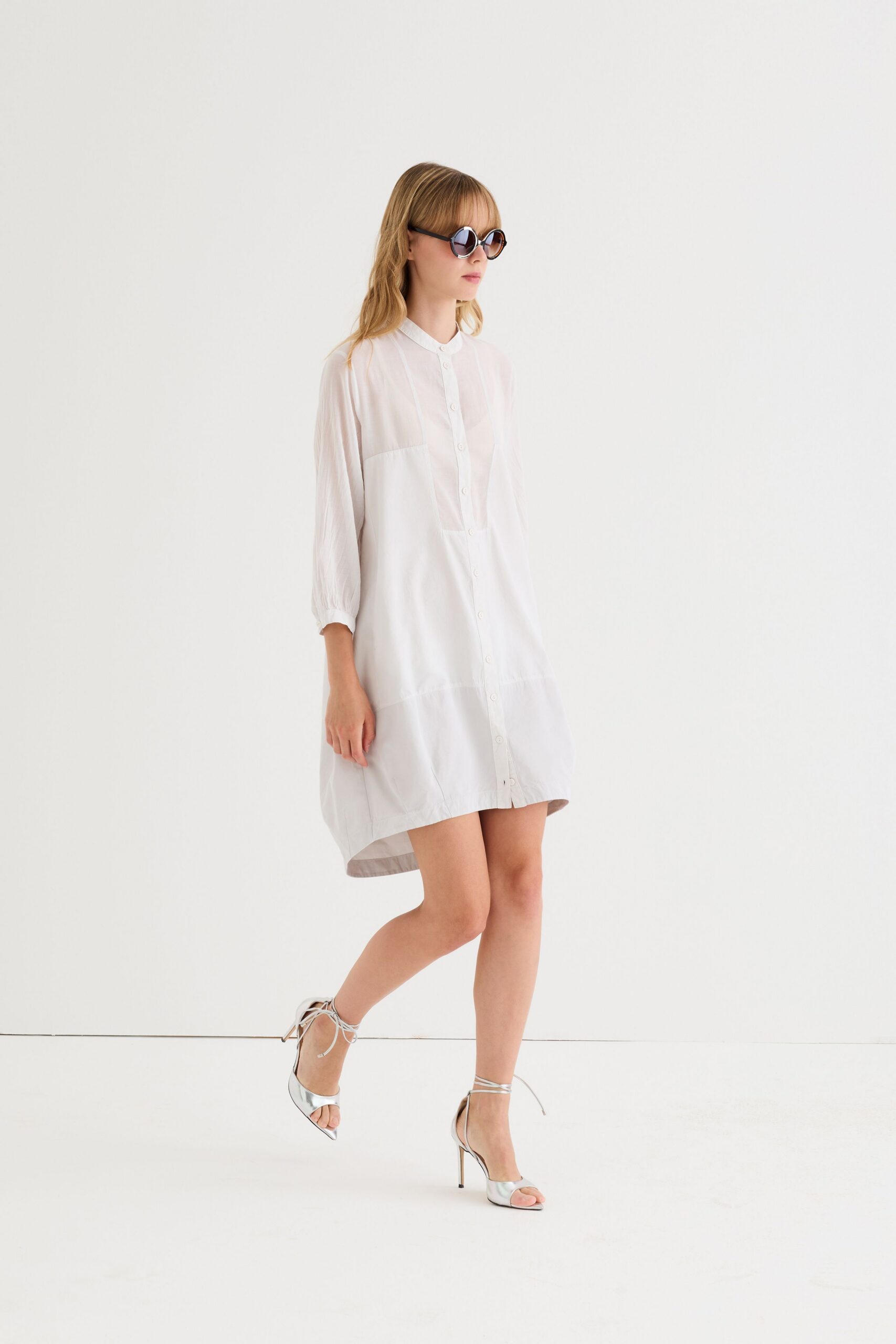 white cotton long-sleeve collared relaxed buttoned sheer shirt-dress