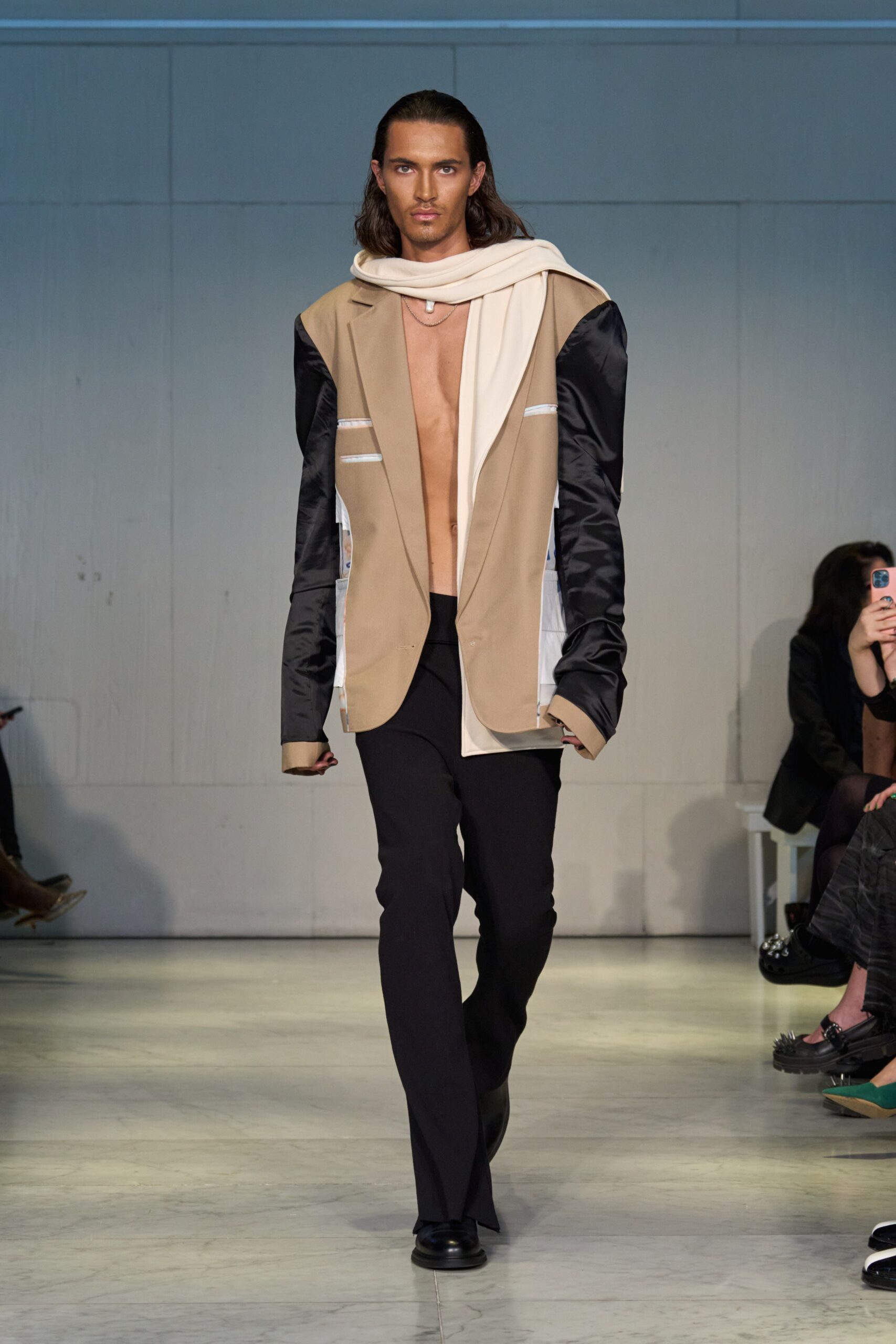 oversized beige jacket with black pants