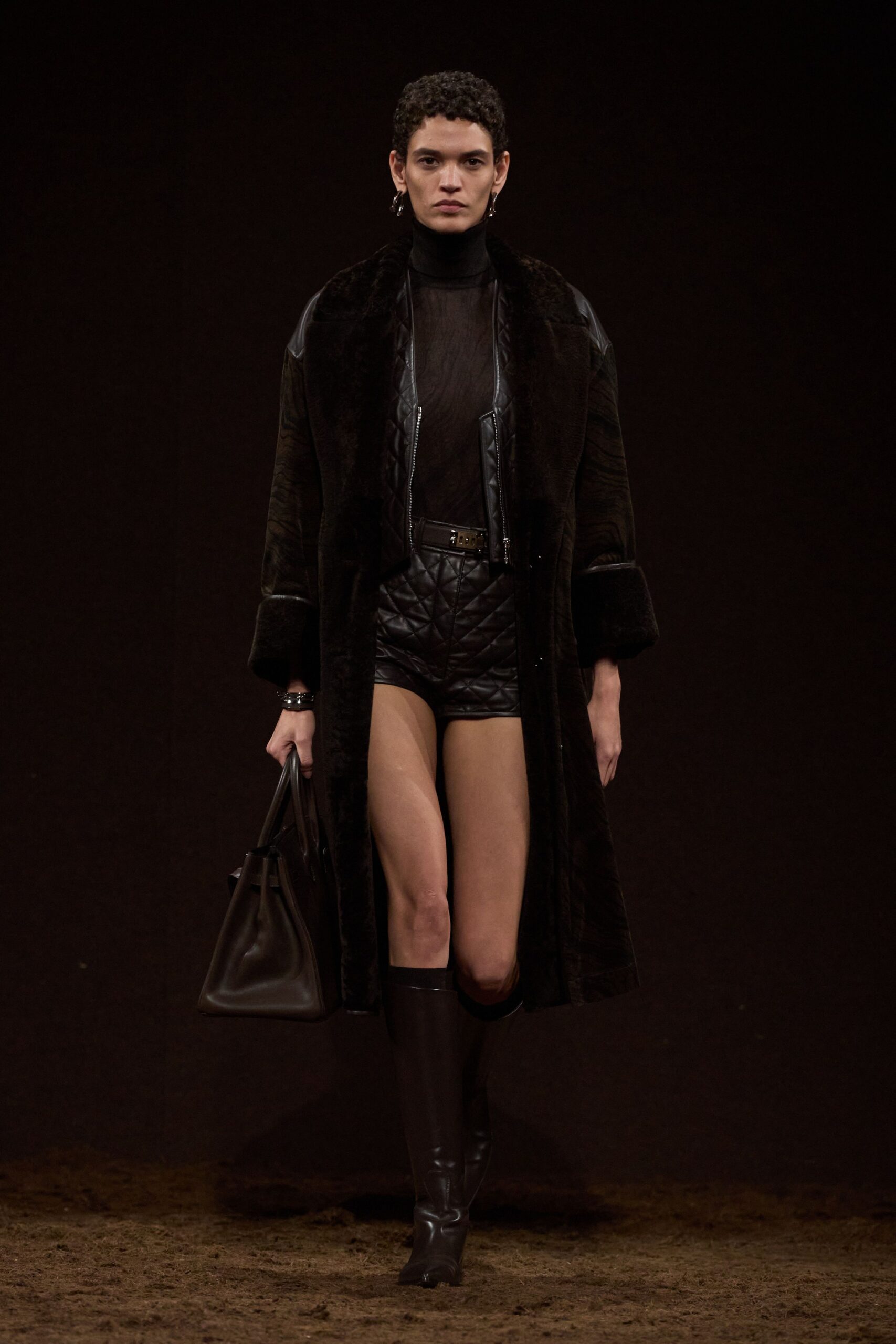 black fur coat with leather shorts