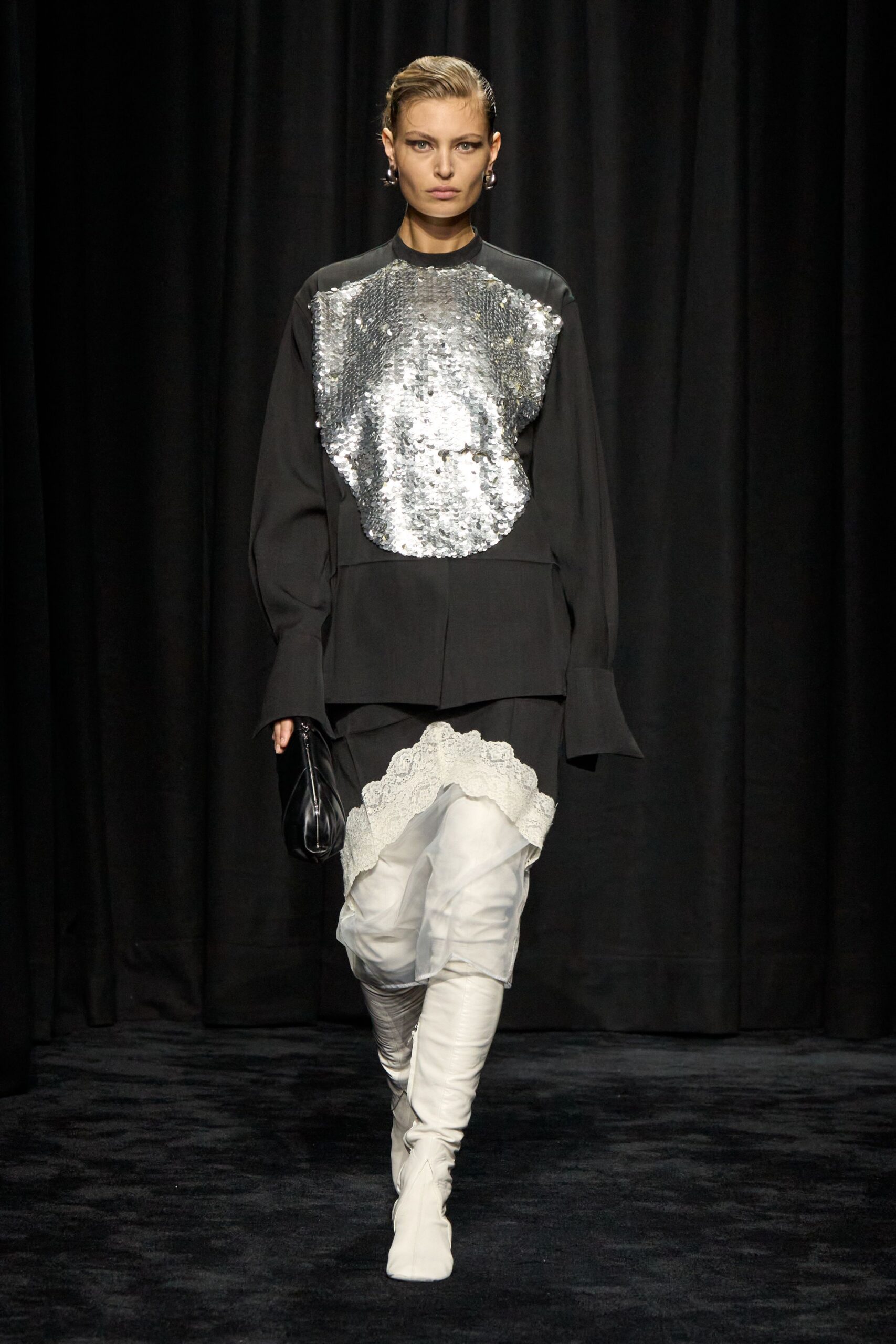 black silver sequined top with white pants