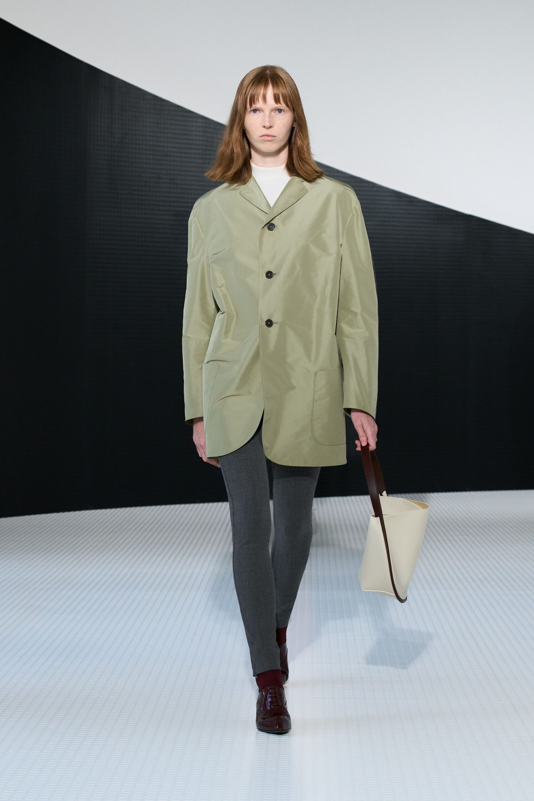 green relaxed jacket with gray pants