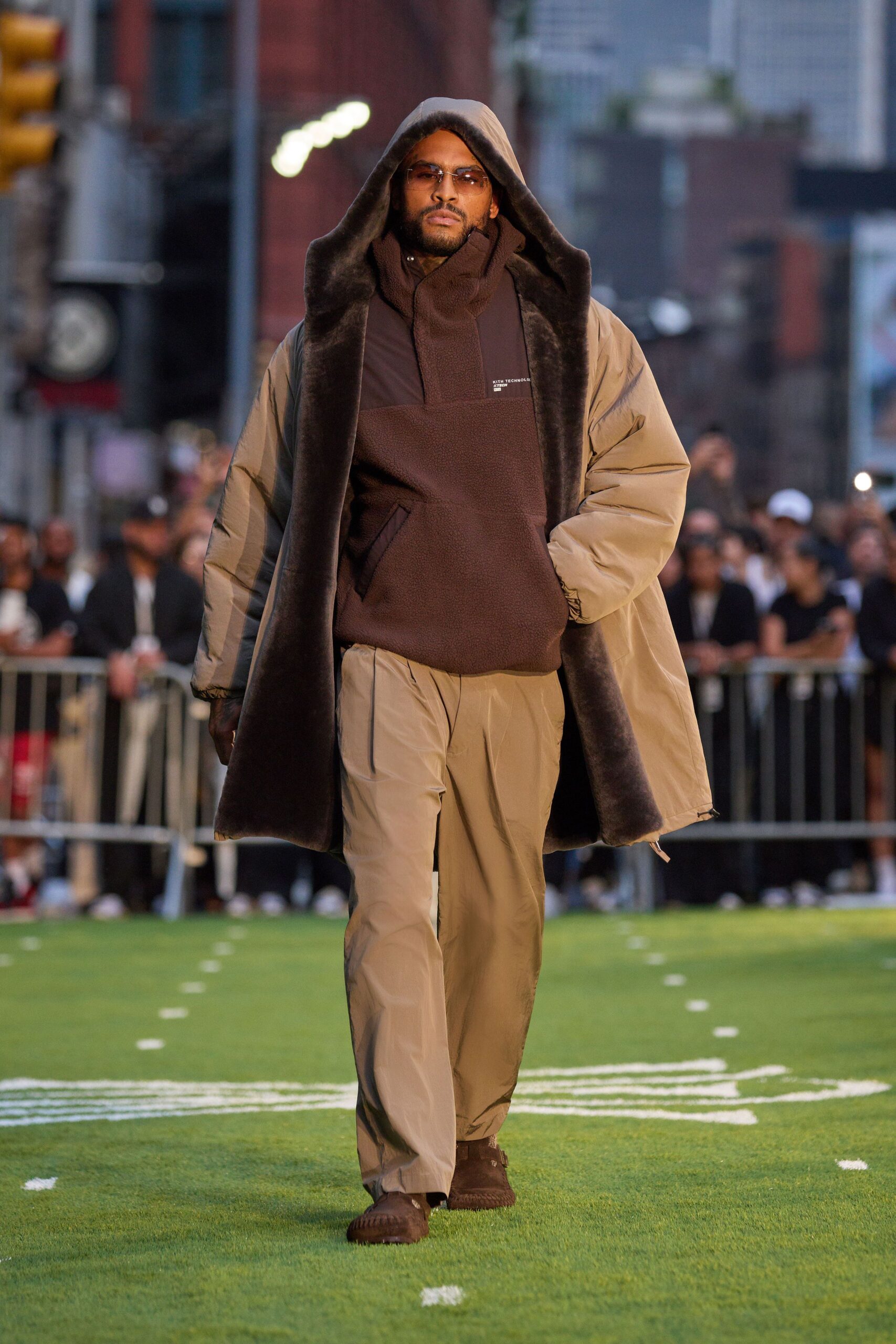 beige faux-fur coat with brown hoodie