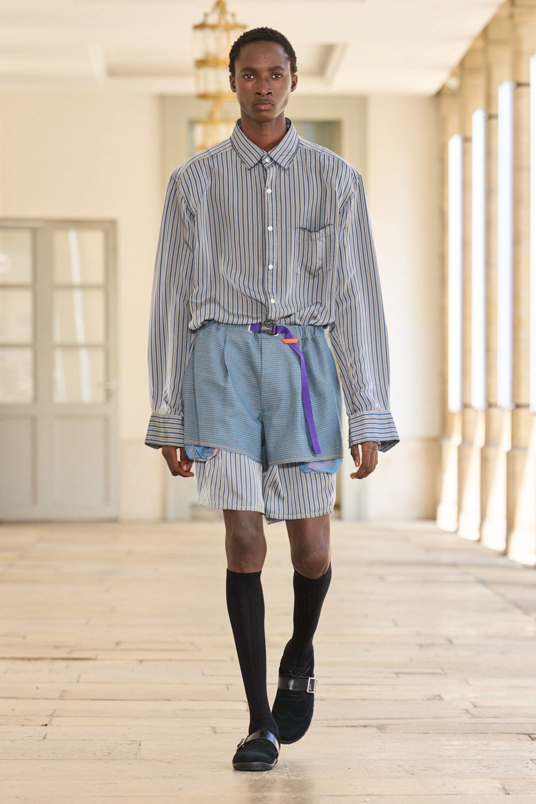 blue striped shirt gray shorts