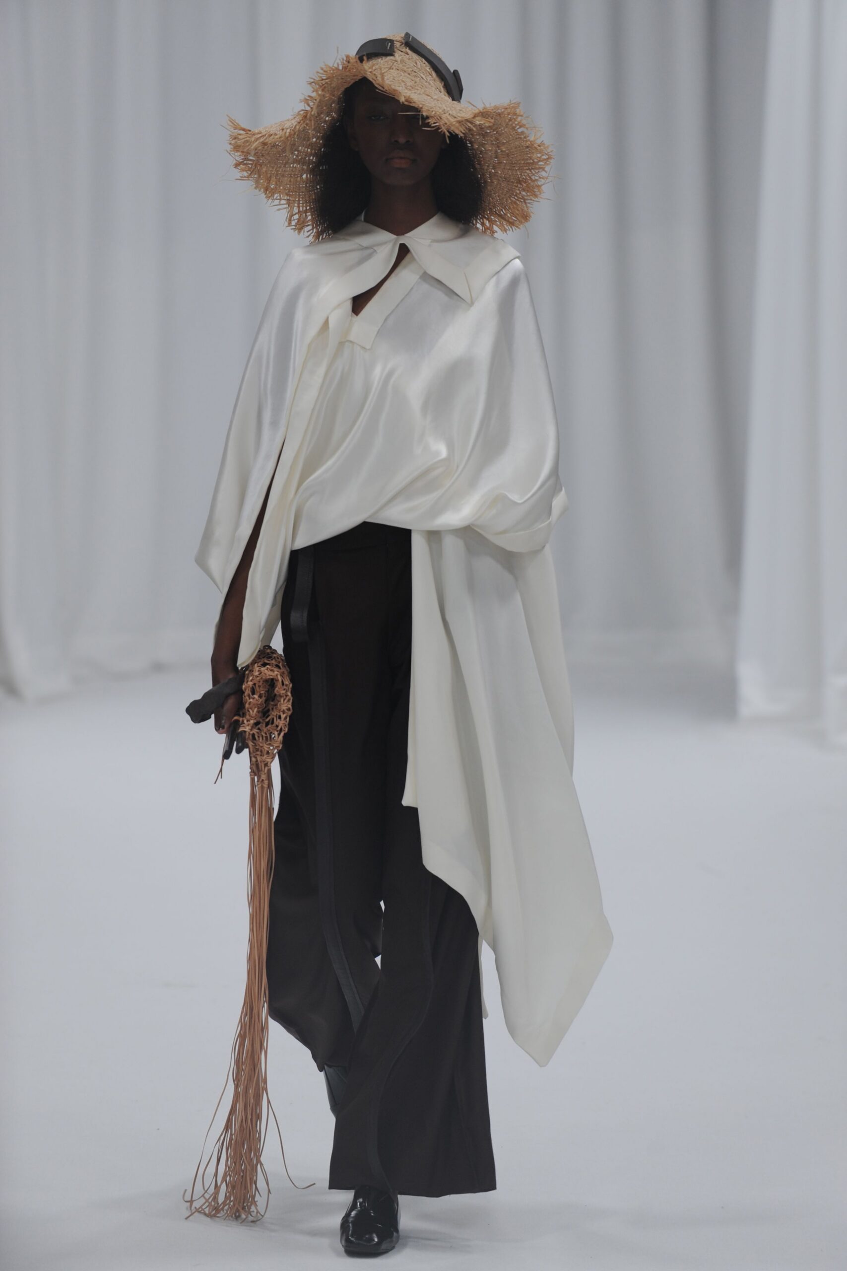 white silk cape black pants