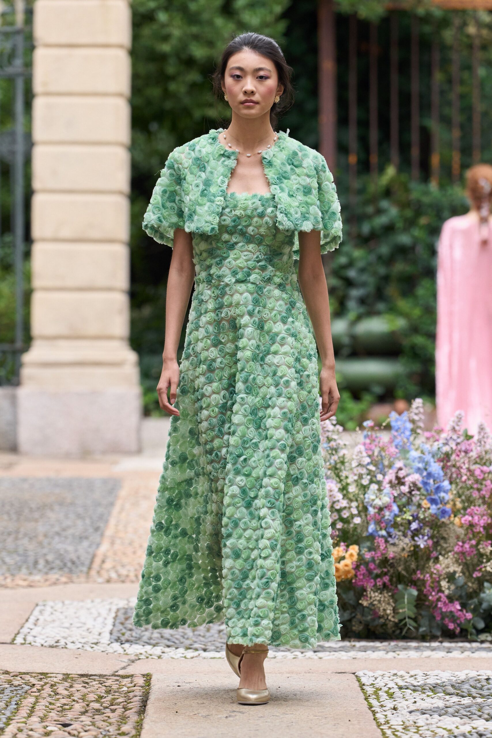 green silk sleeveless v-neck fitted layered flared gown