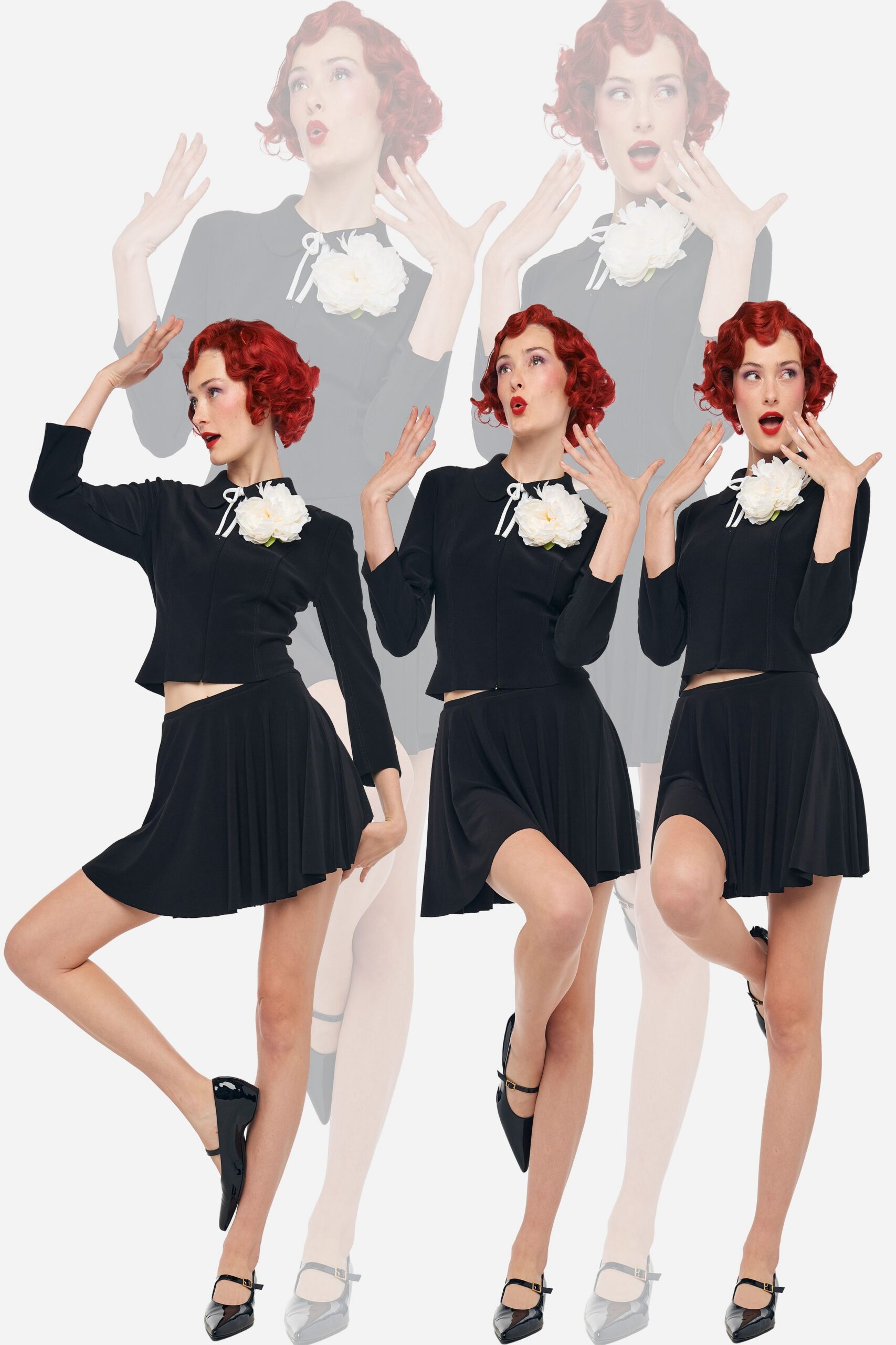 black fitted jacket and mini skirt
