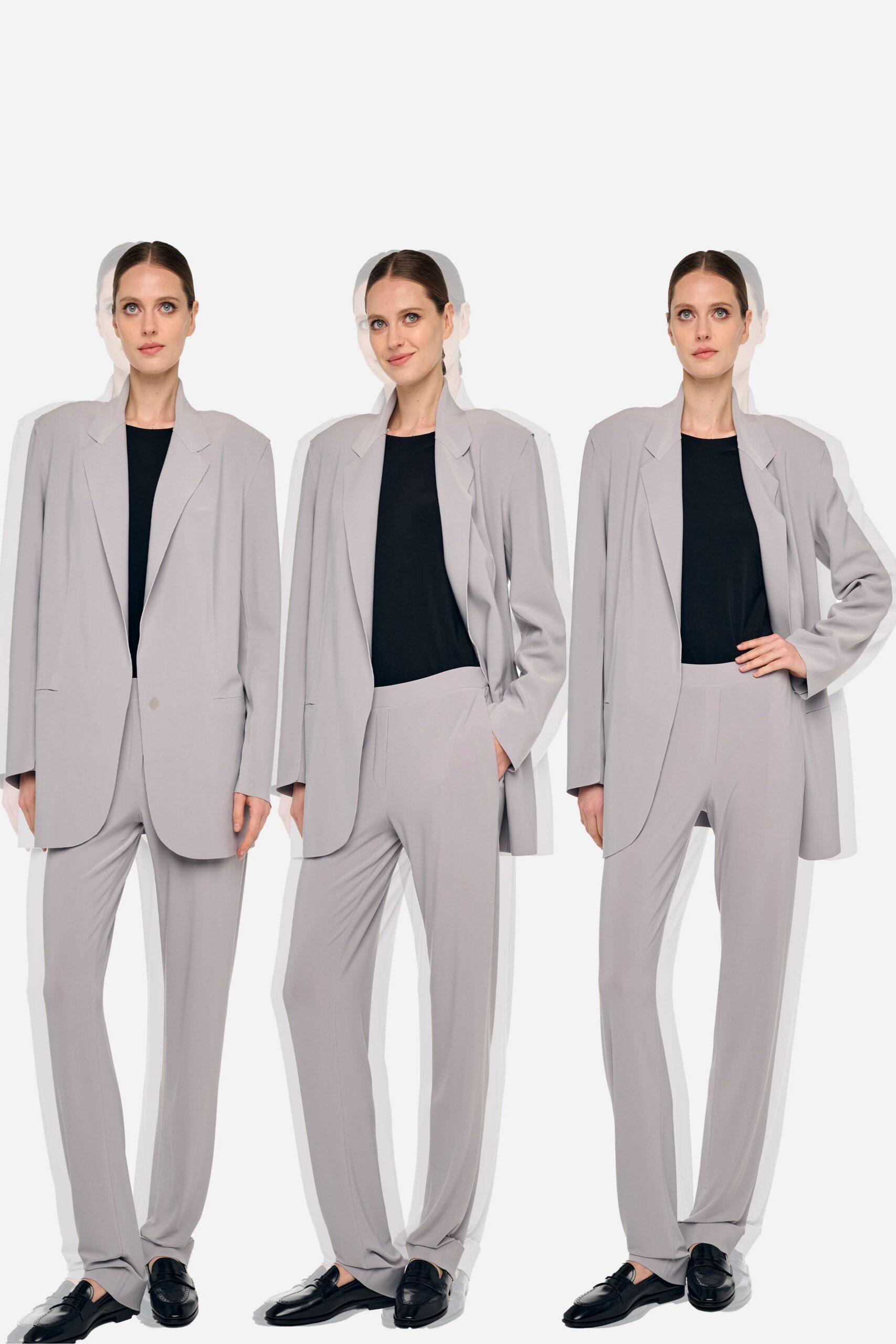 gray blazer with black top and pants