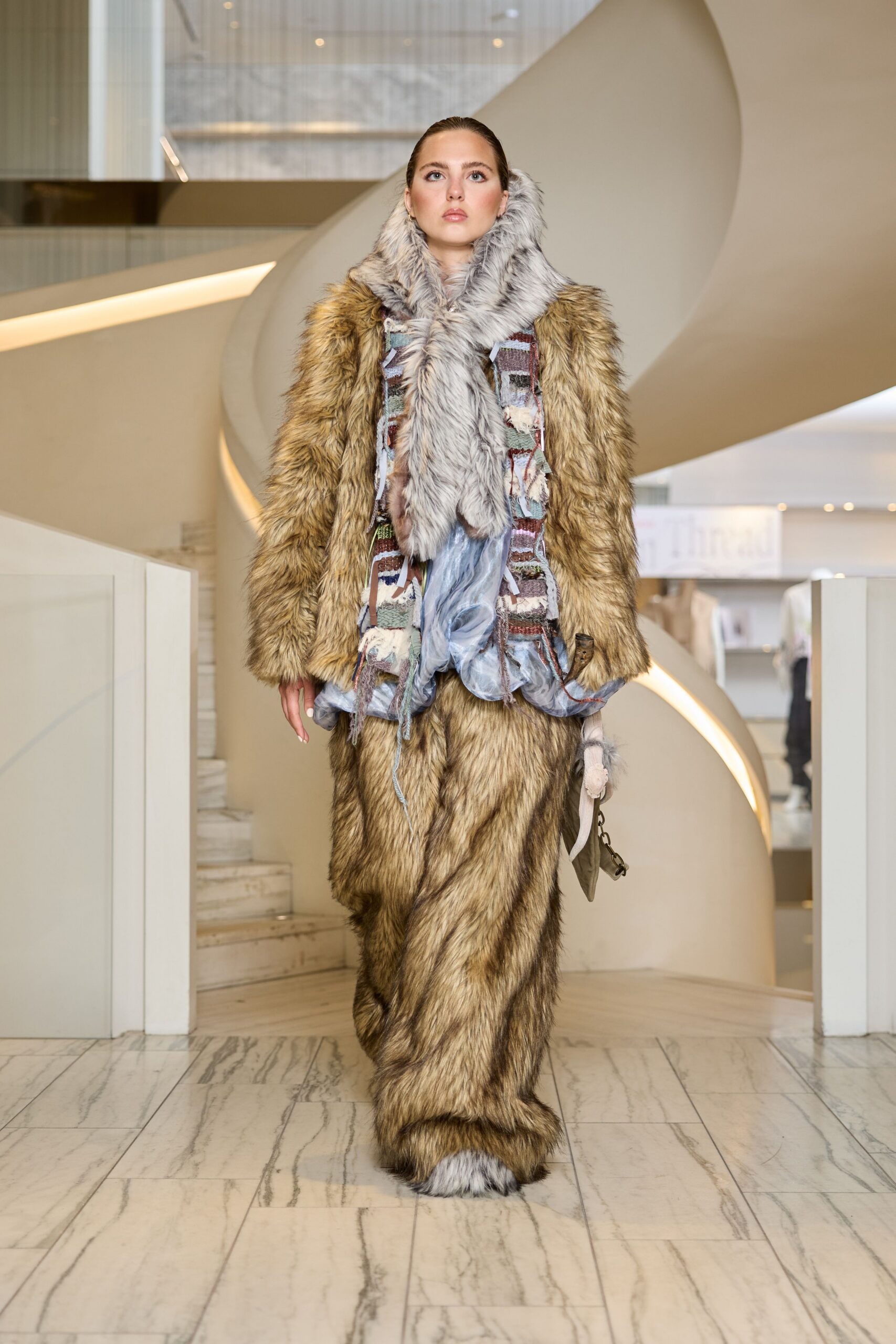 brown fur coat with blue top