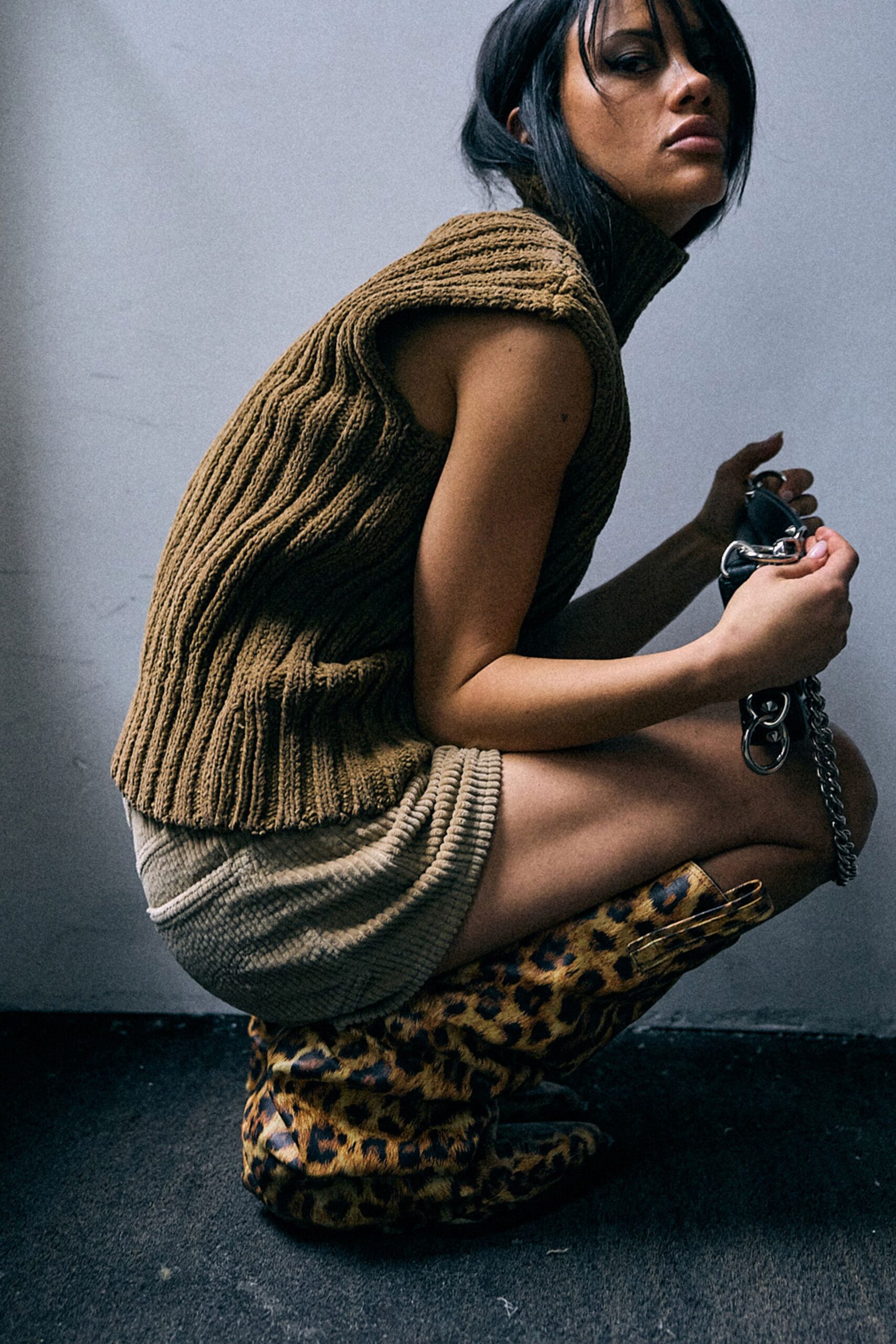 brown knit sleeveless high-neck fitted ribbed top