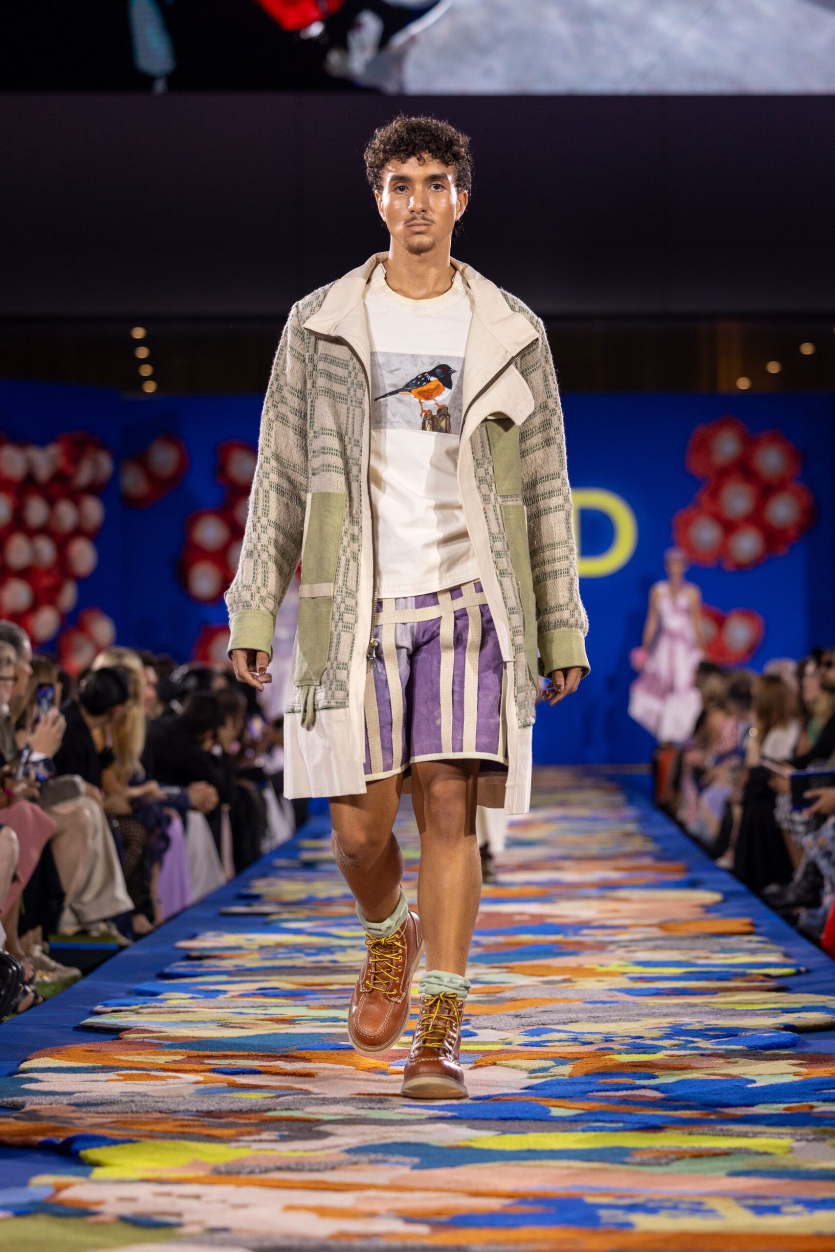 beige relaxed jacket with striped shorts