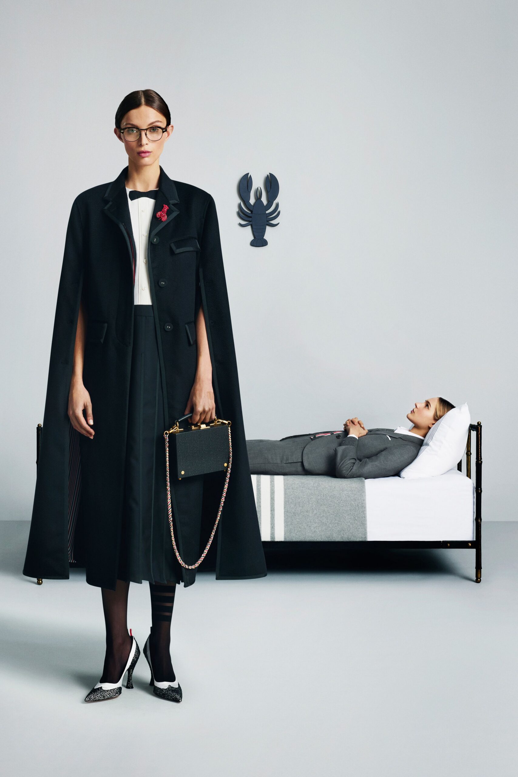 black wool cape with blouse and skirt
