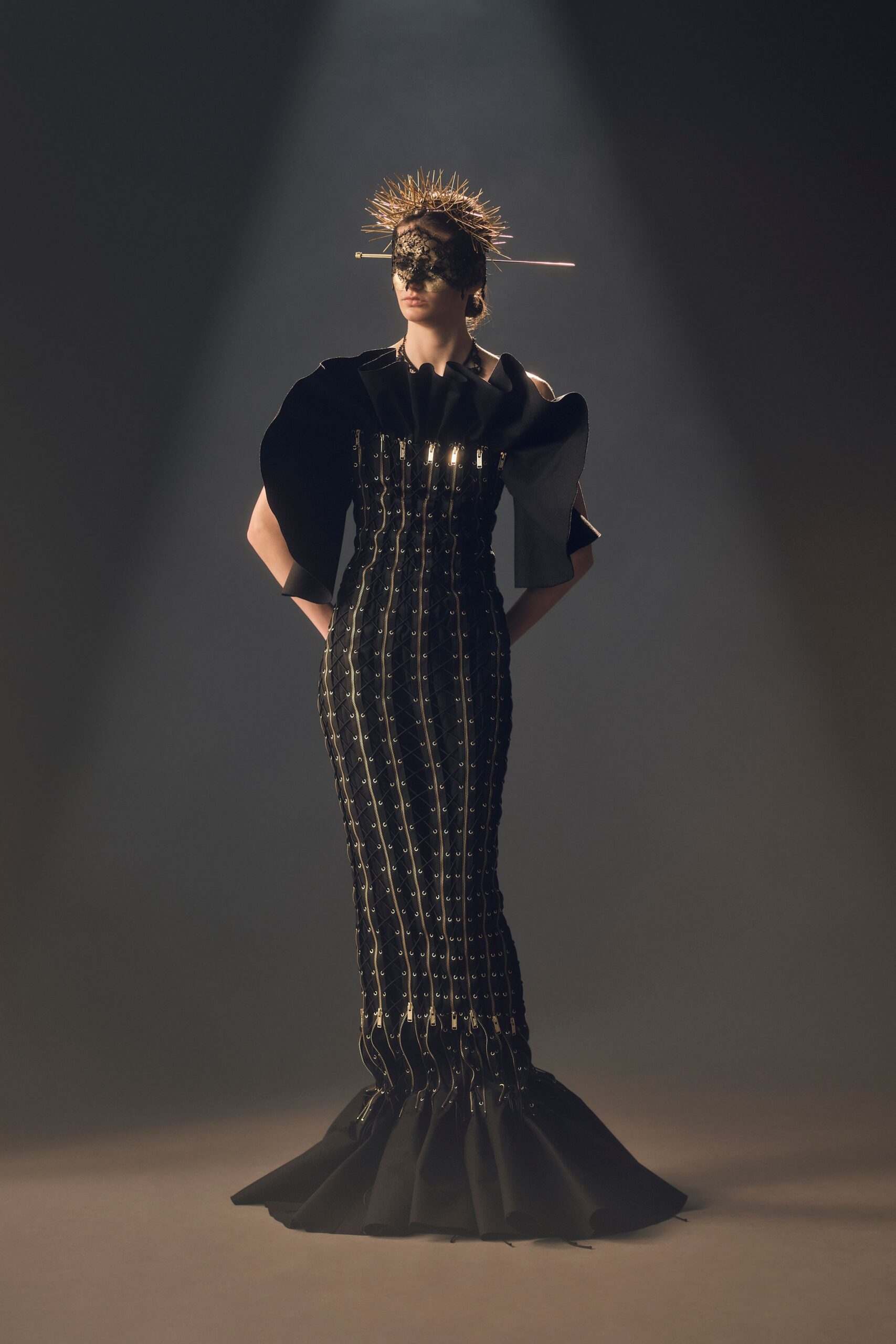 black fitted gown with structured hat