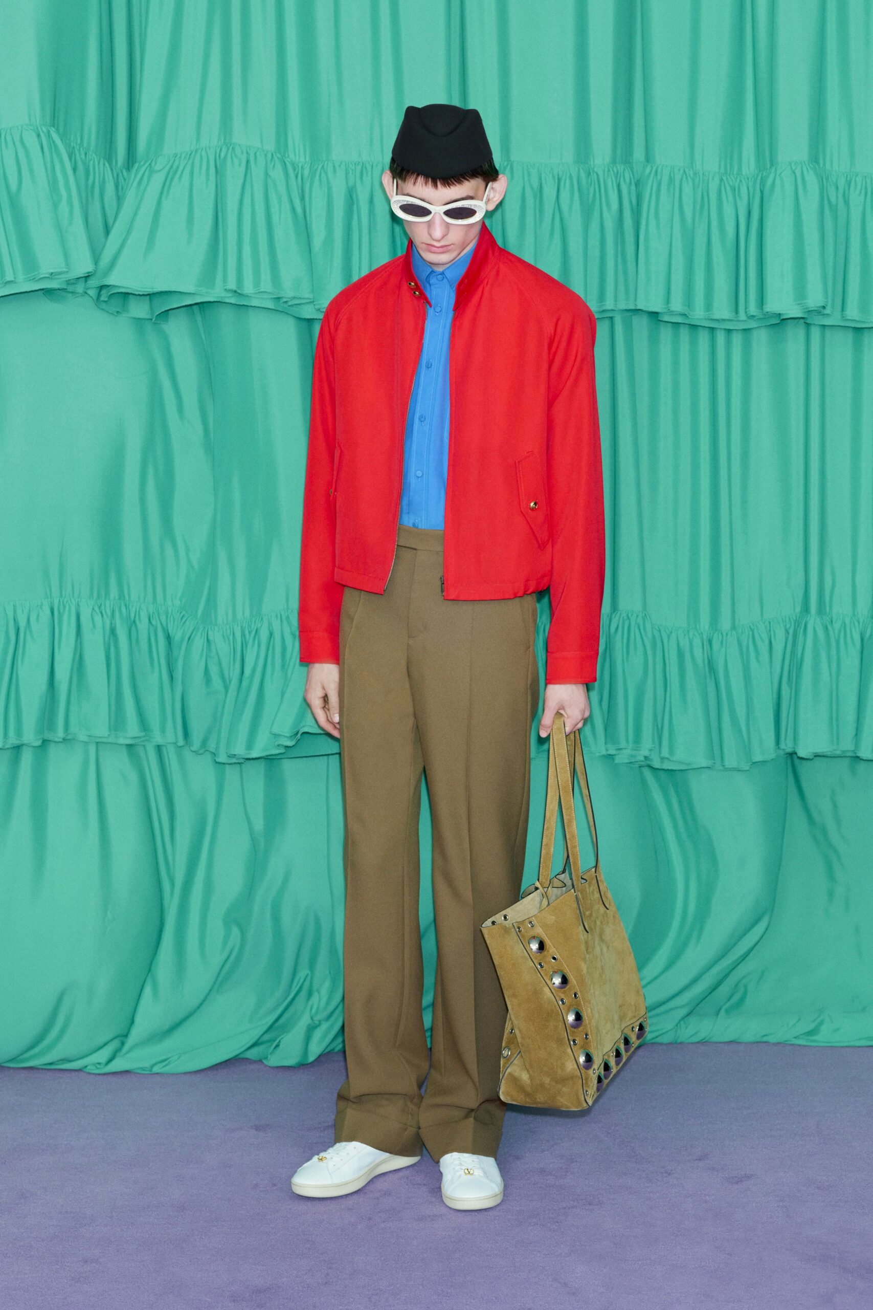 red jacket blue shirt brown pants