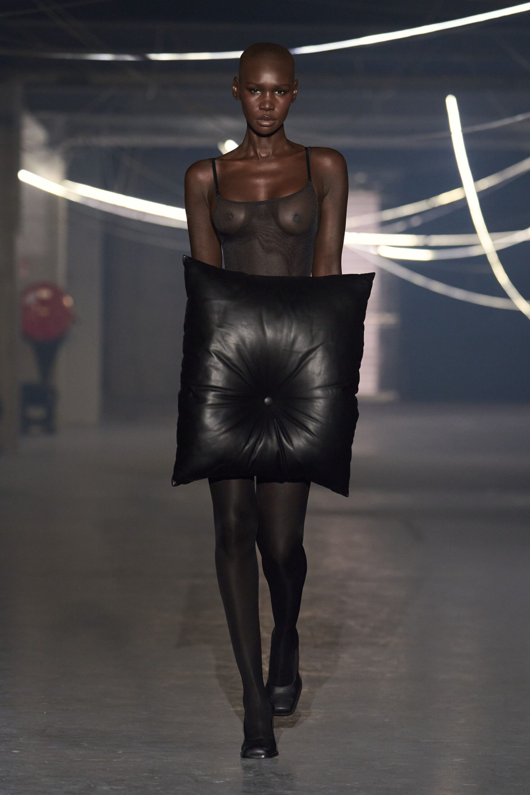 black mesh fitted dress with pillow accessory