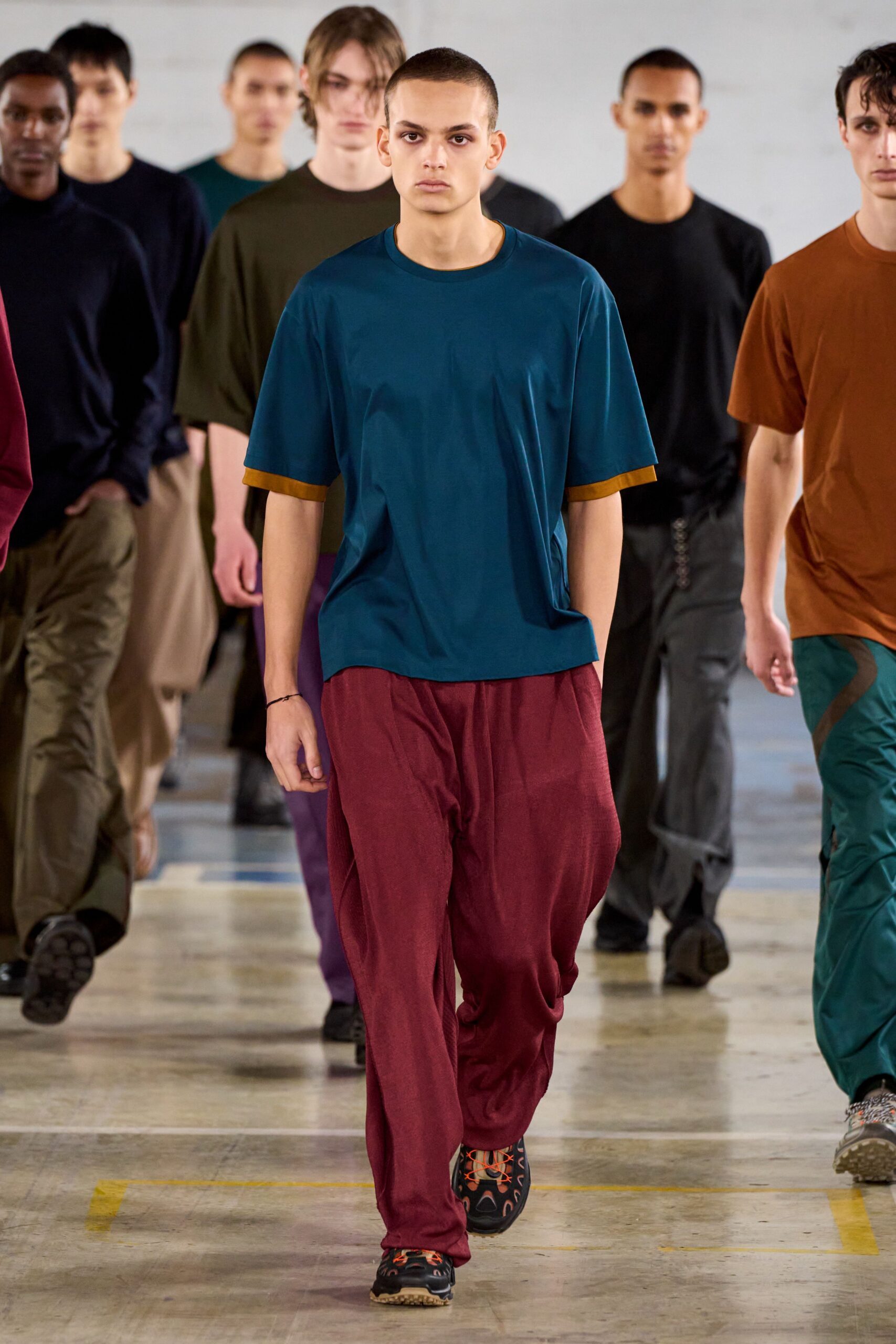 teal t-shirt maroon pants