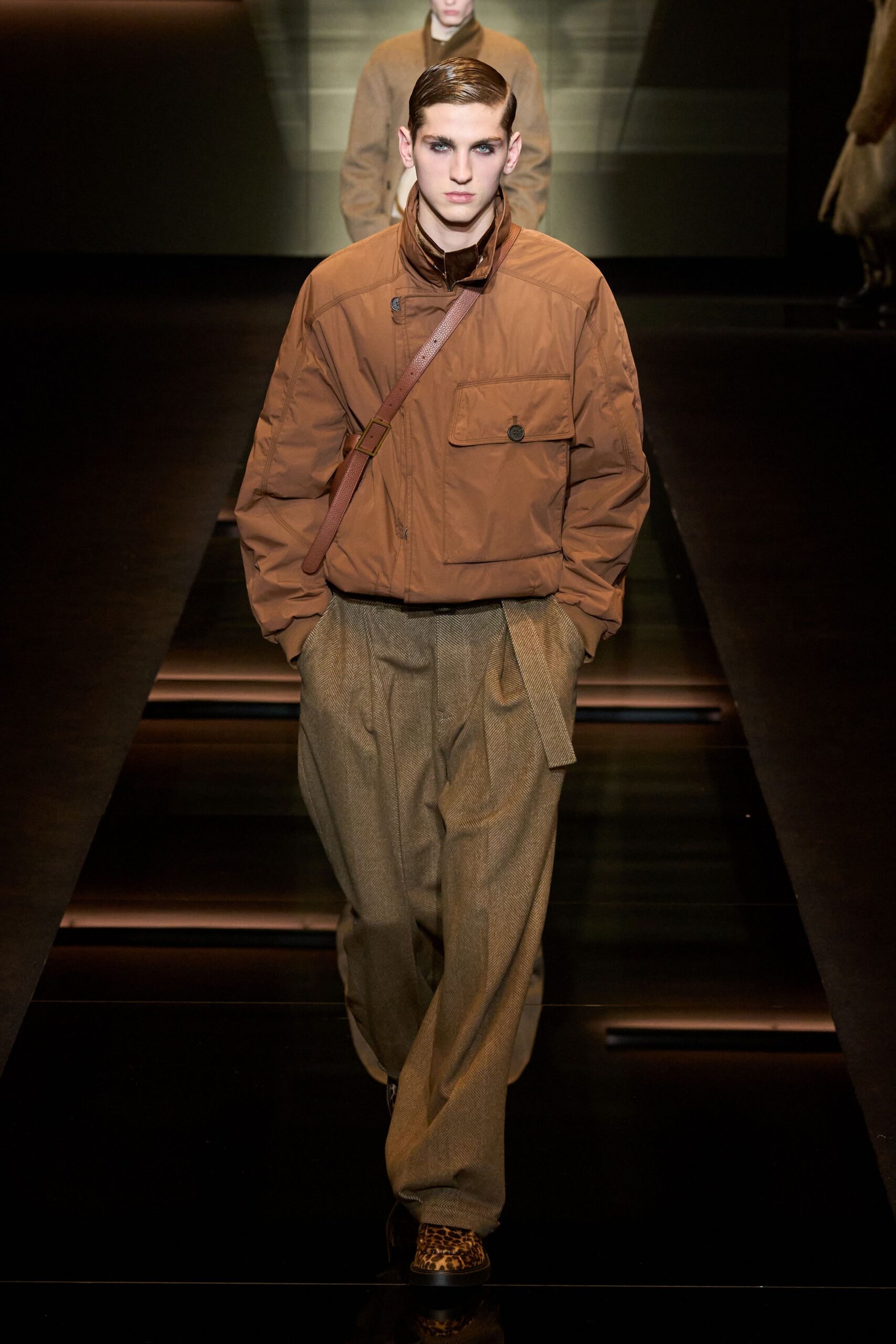 brown relaxed jacket with beige pants