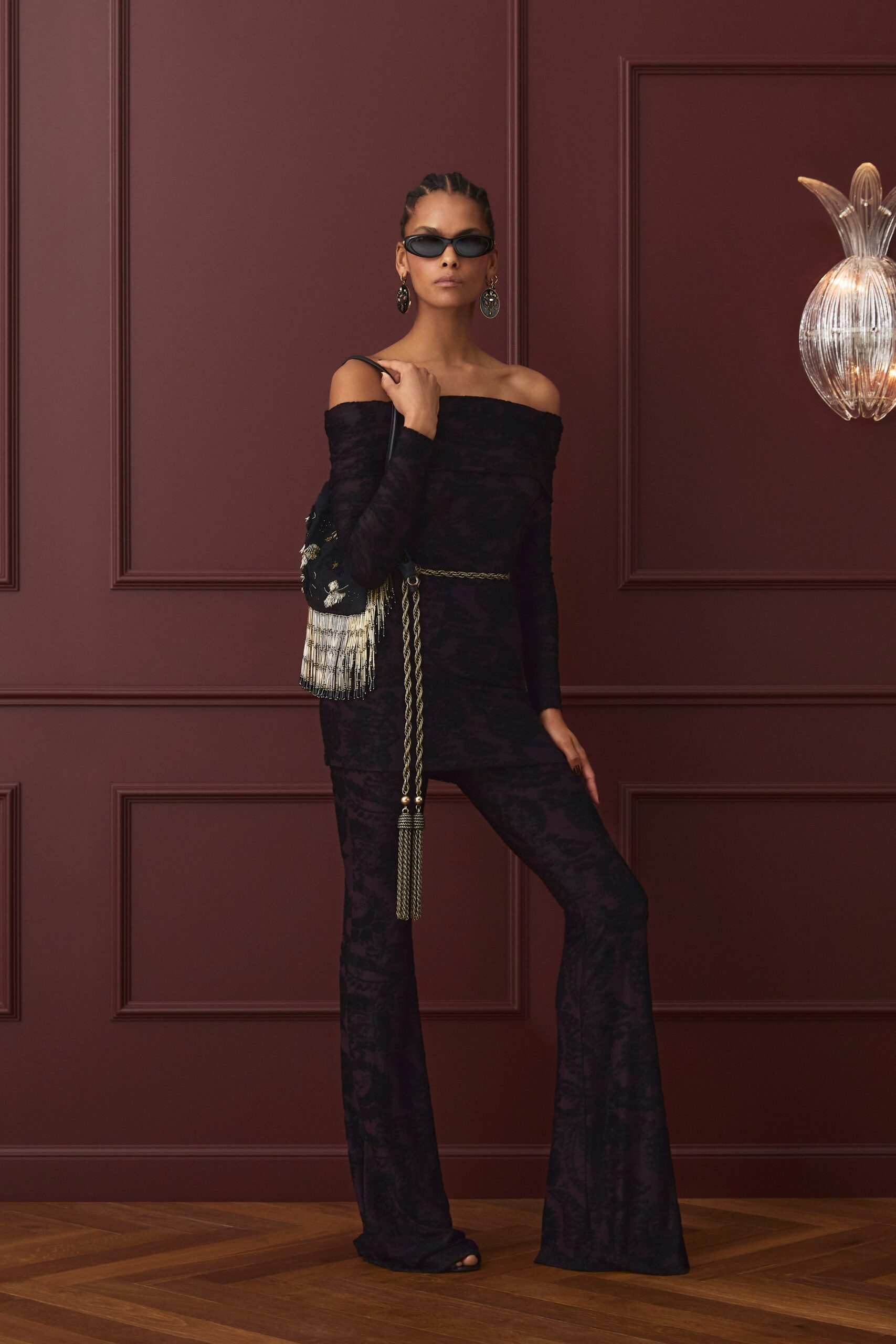 black fitted off-shoulder jumpsuit