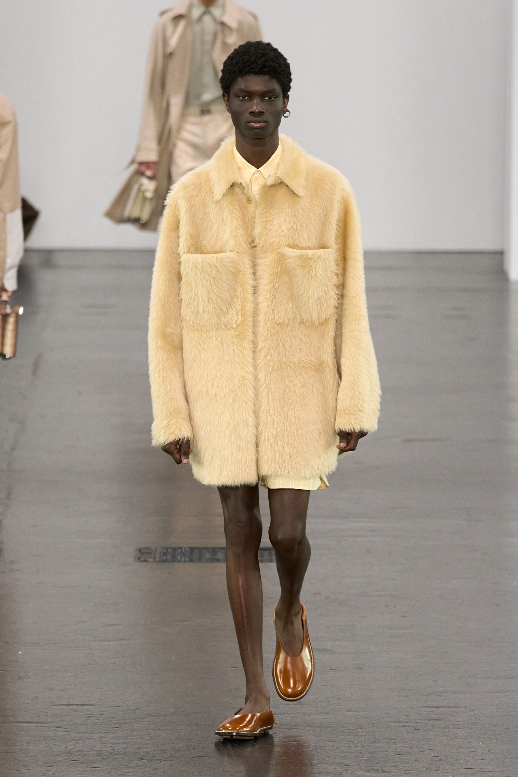 yellow faux-fur coat with shorts