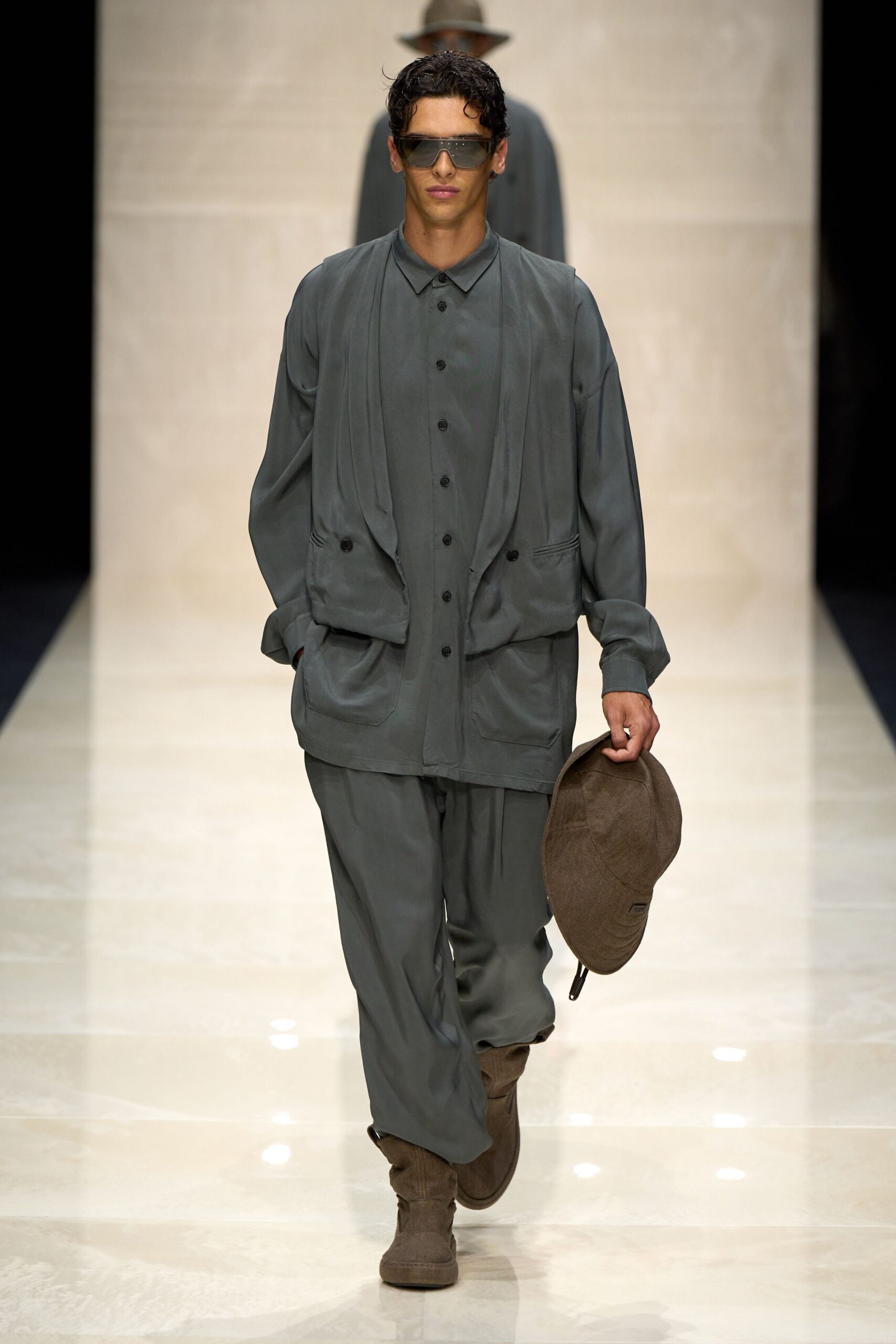 gray relaxed suit with brown accessories
