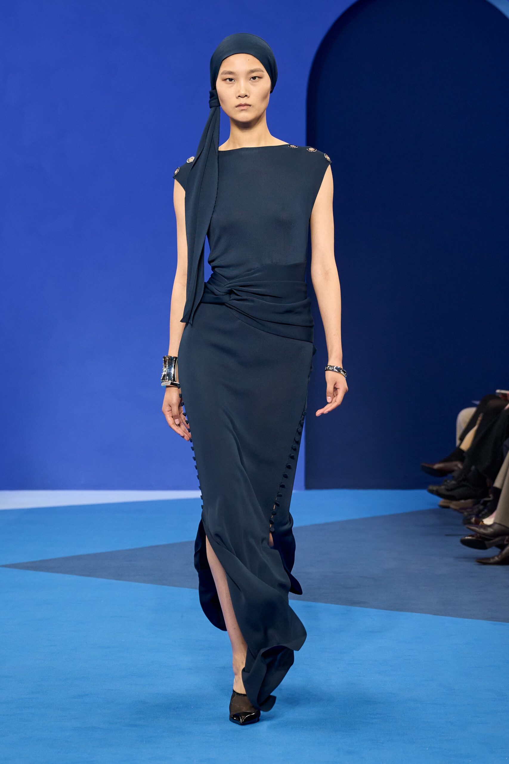 blue silk sleeveless high-neck fitted draped flowing gown