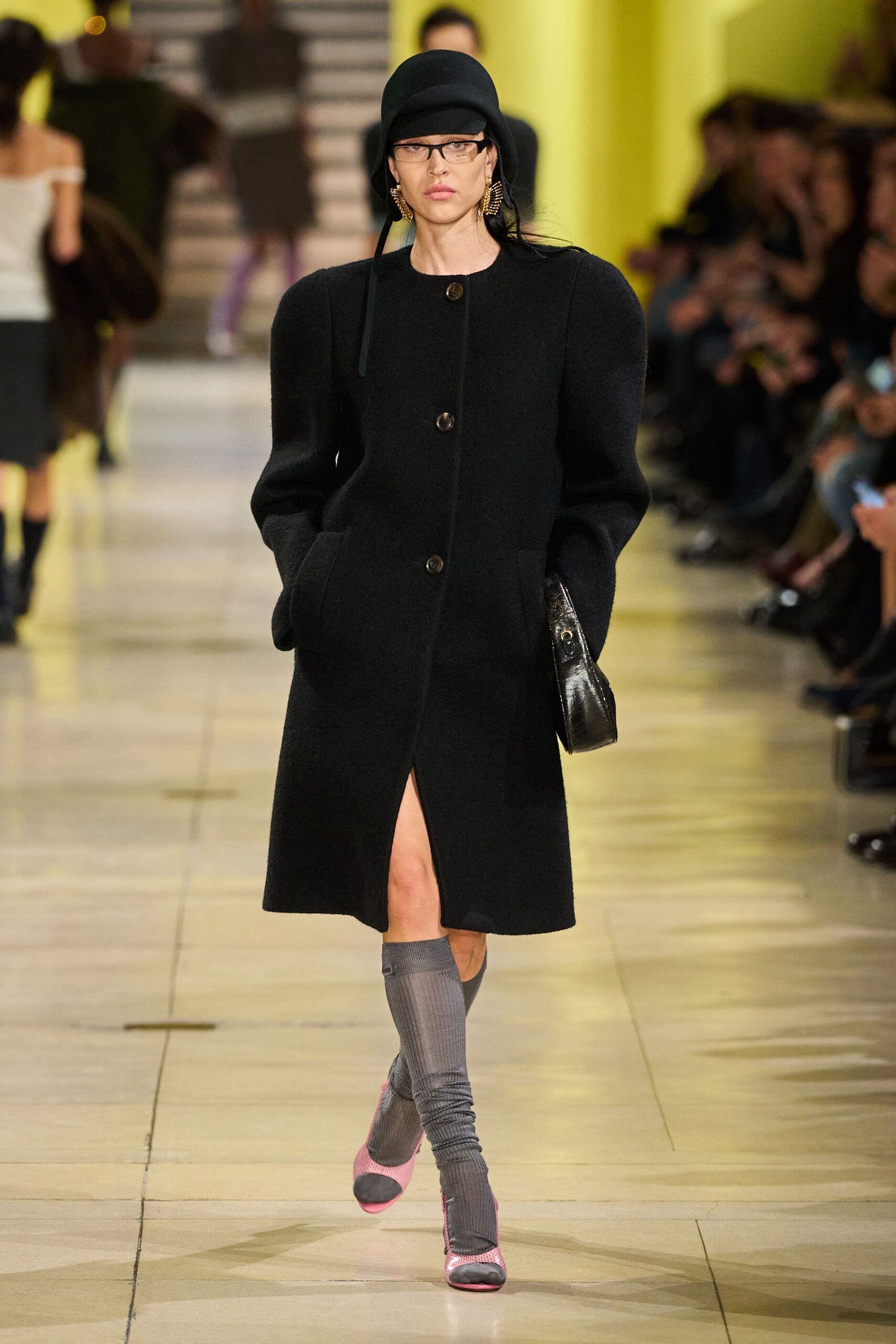 black wool long-sleeve collared structured buttoned coat