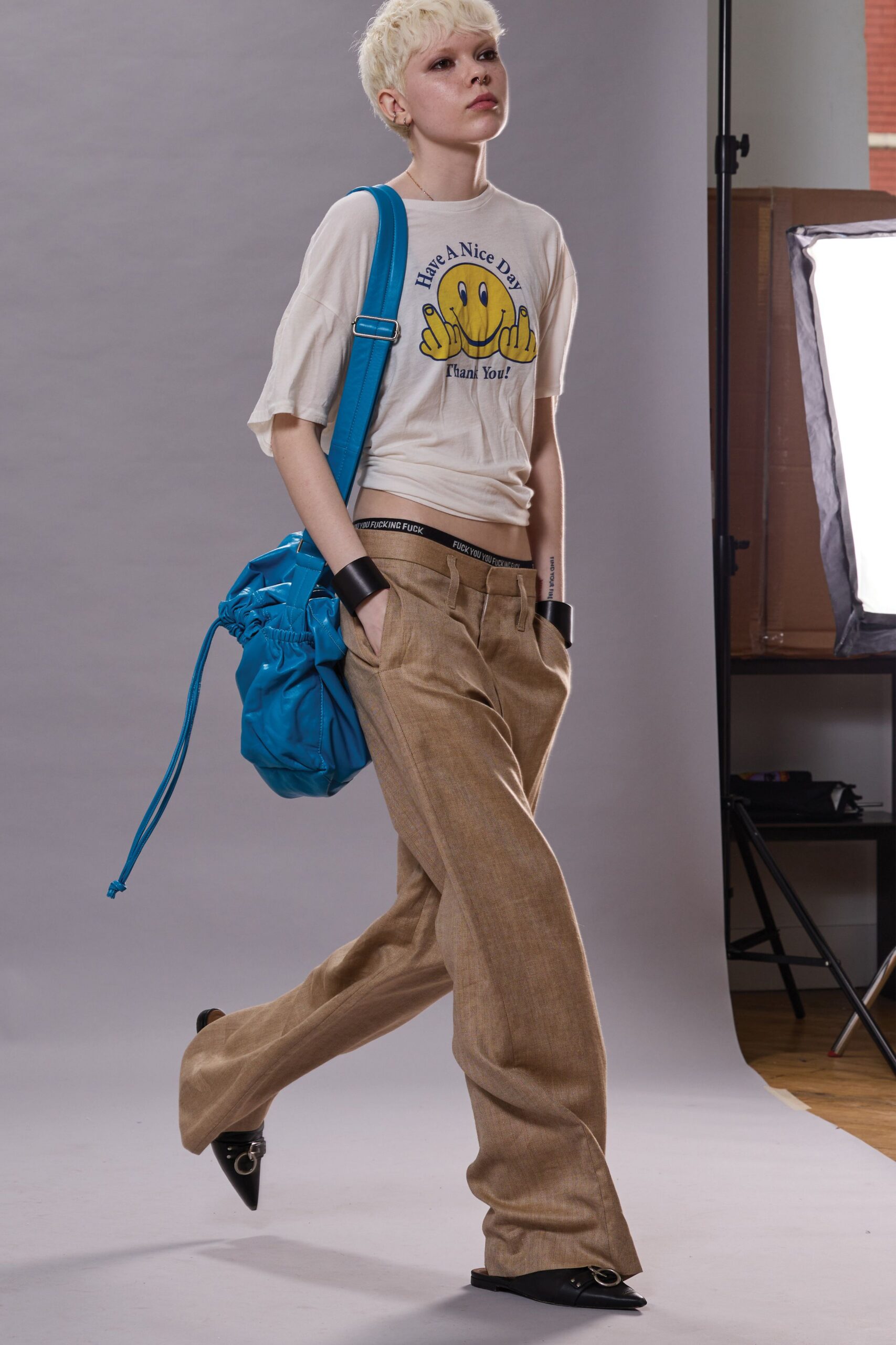 relaxed white t-shirt with beige pants