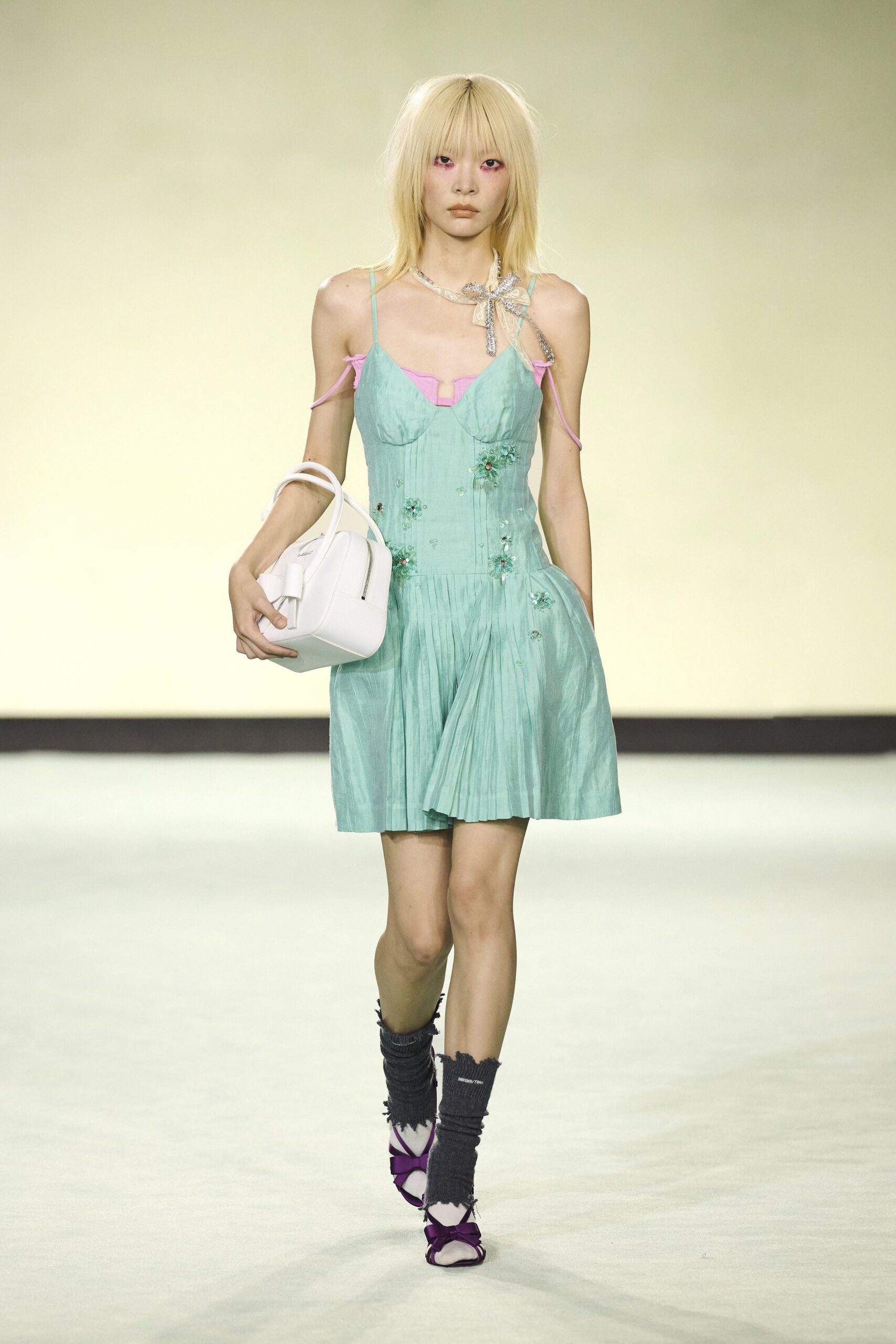 green silk sleeveless v-neck fitted pleated mini dress