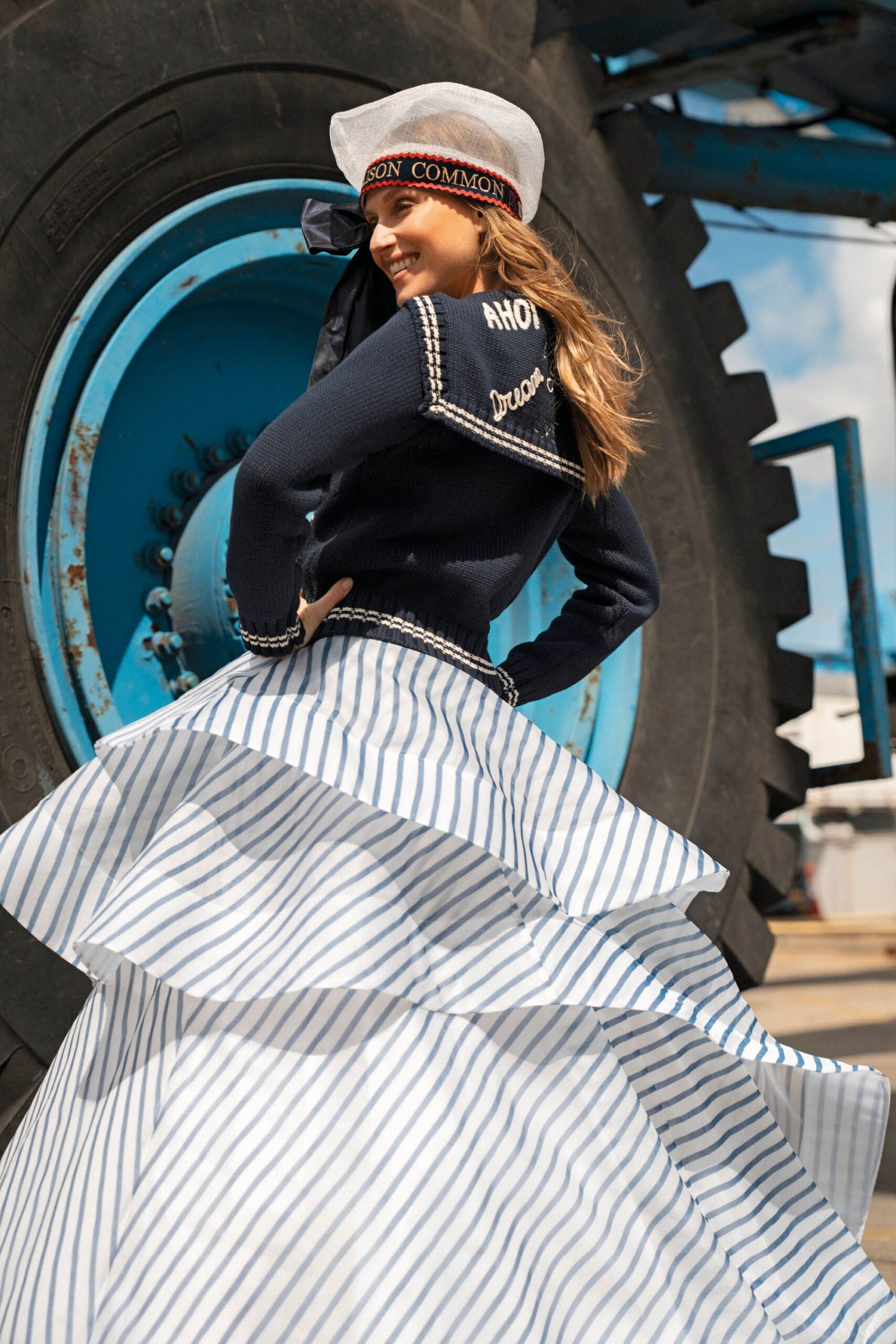 navy top with tiered striped maxi skirt