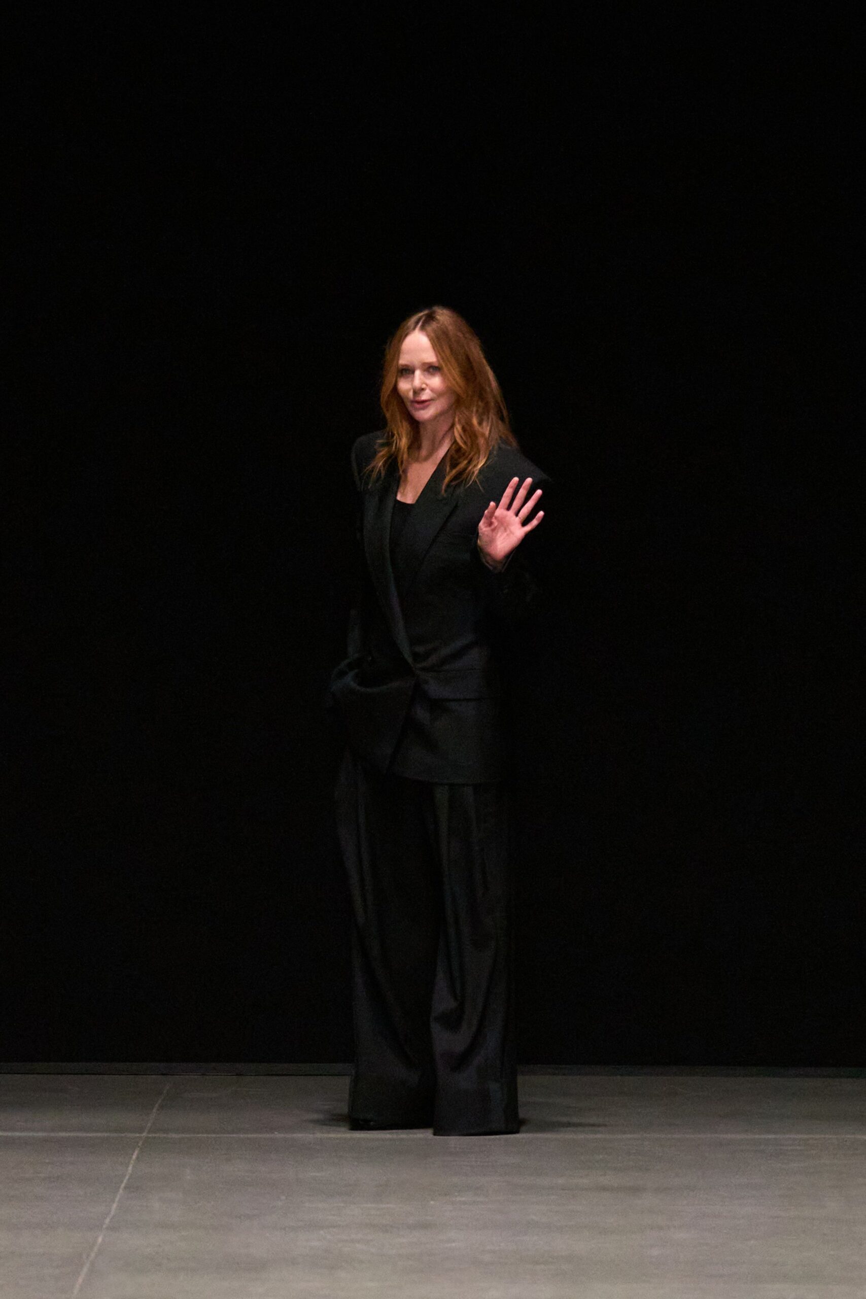 black tailored blazer and relaxed pants