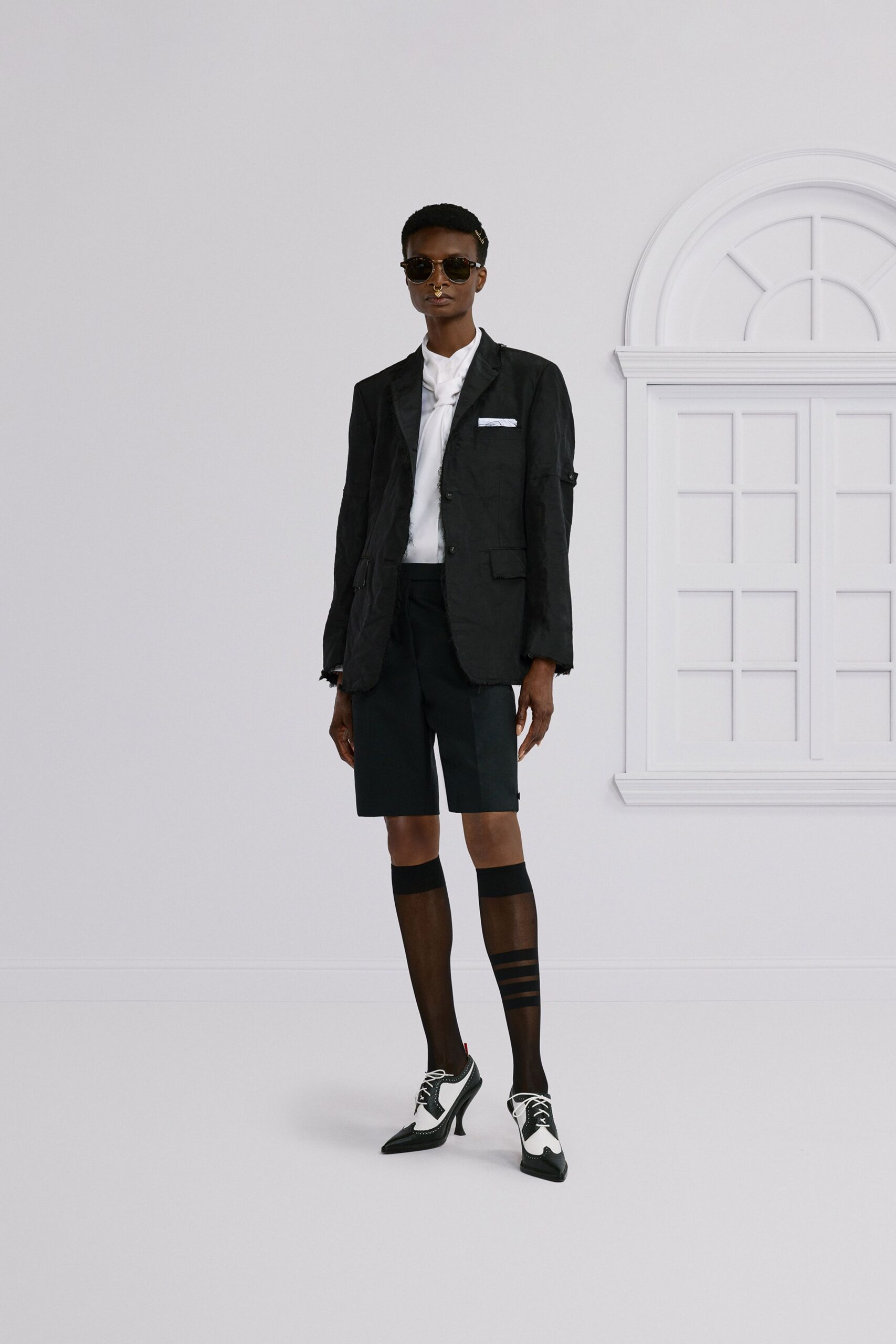 black tailored blazer with shorts