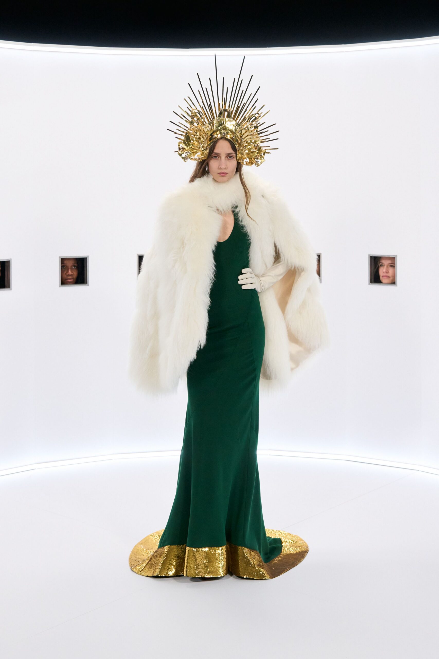 green silk fitted gown with cape