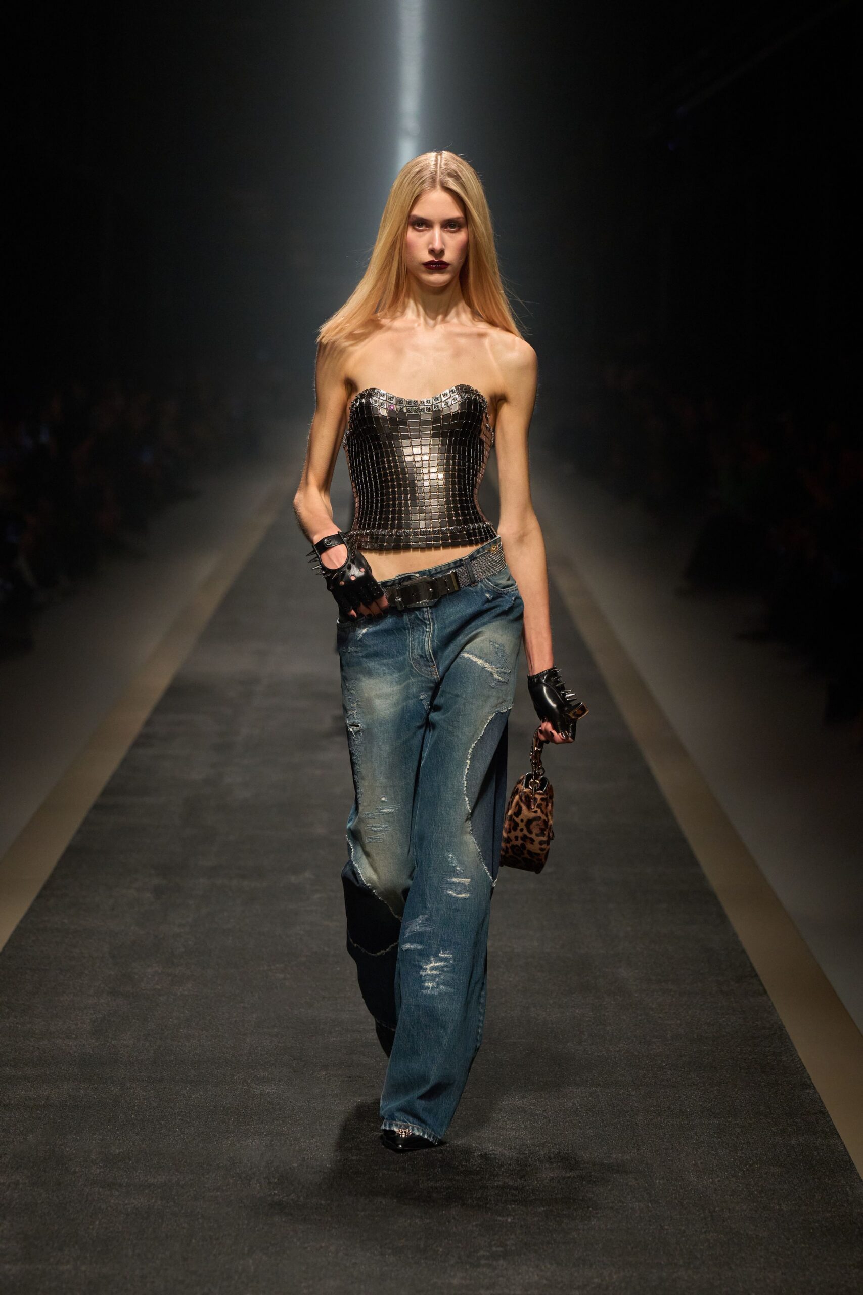 silver metallic fitted top with distressed jeans
