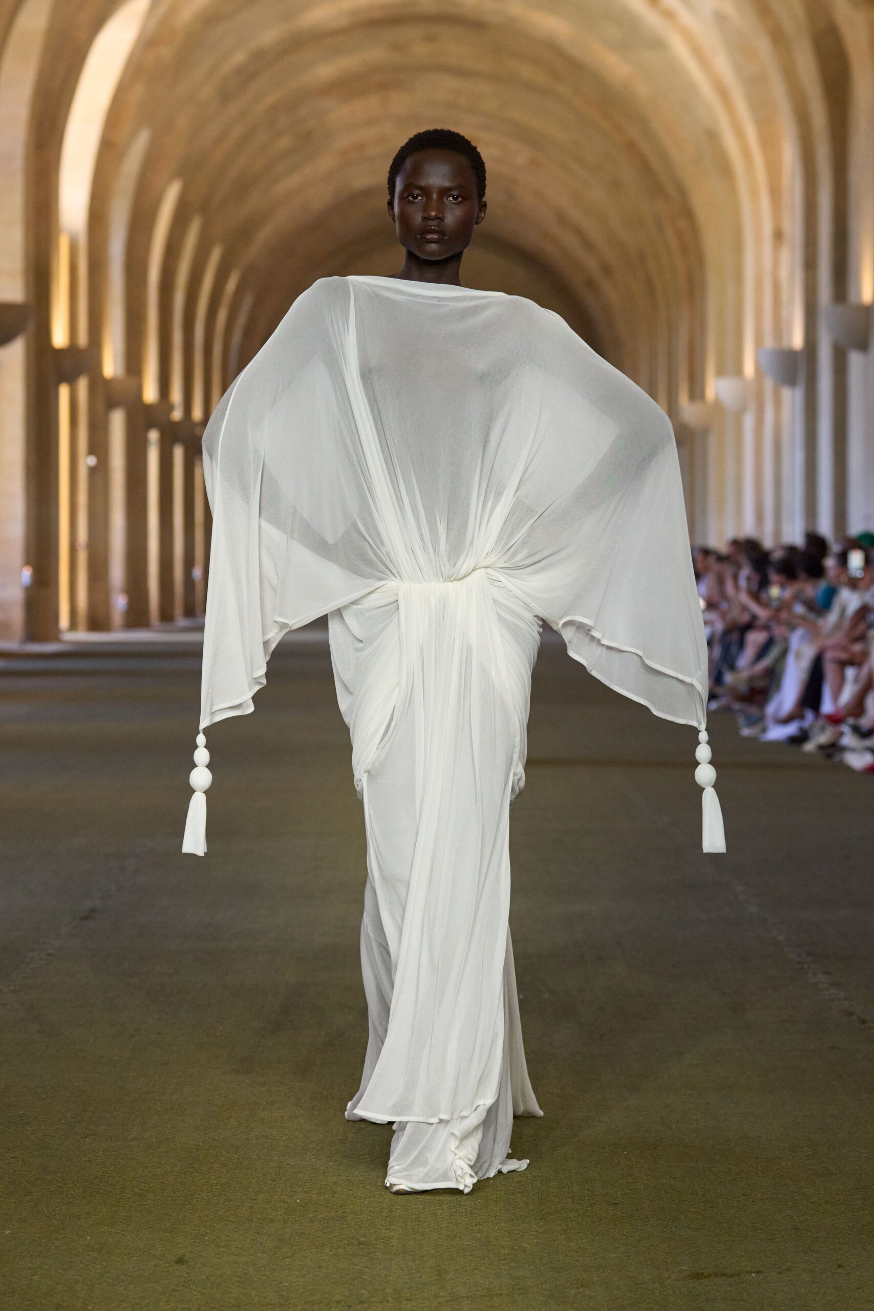 white flowing maxi gown