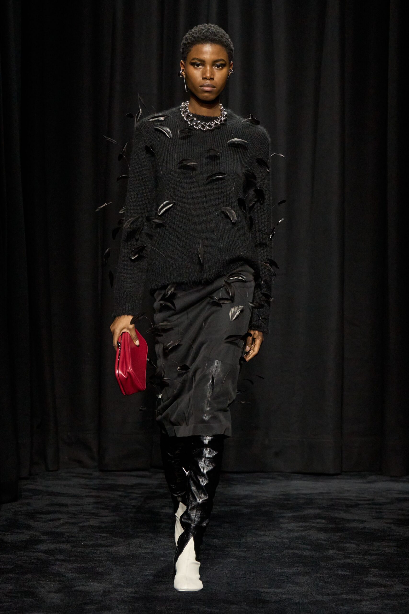 black fitted sweater and skirt