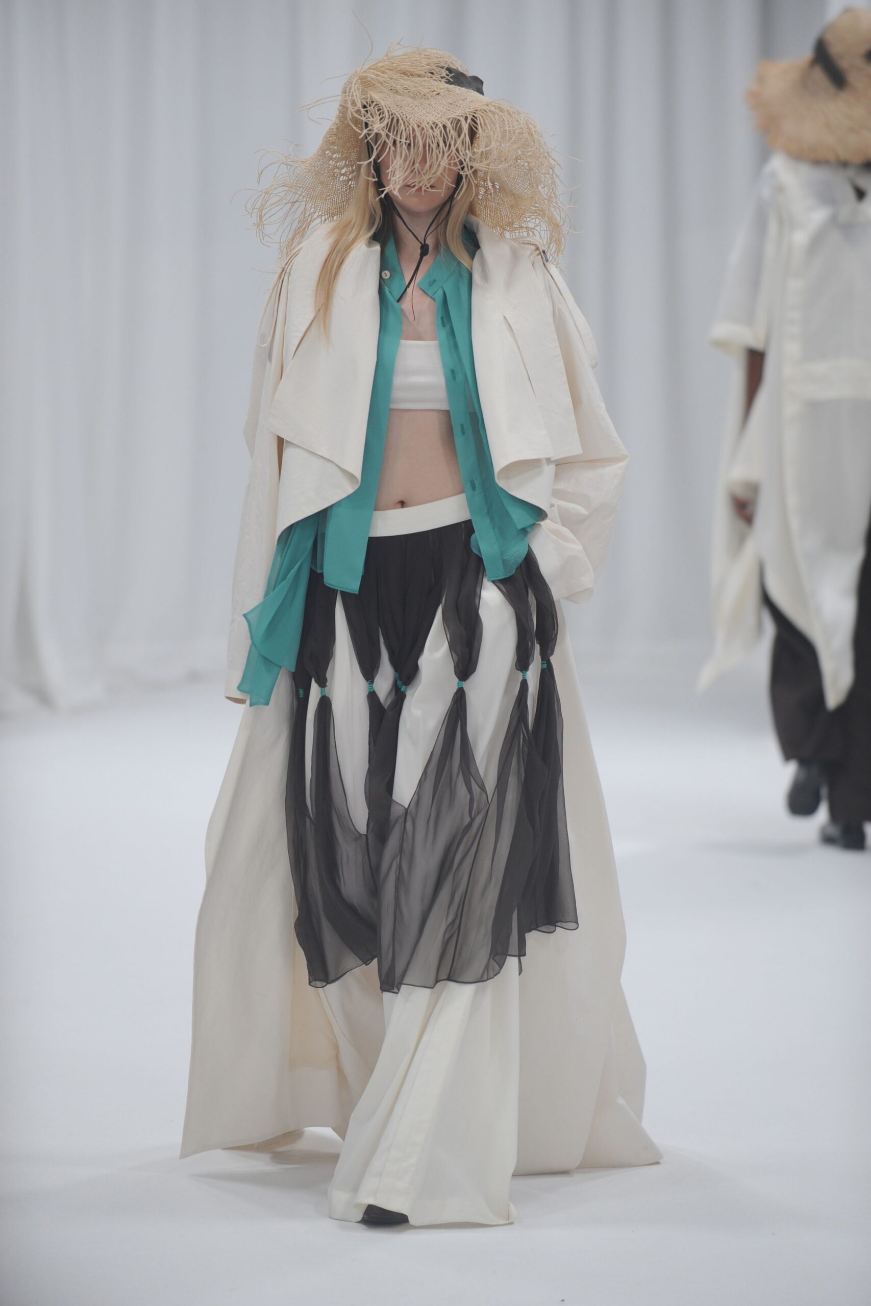 white oversized coat with layered skirt