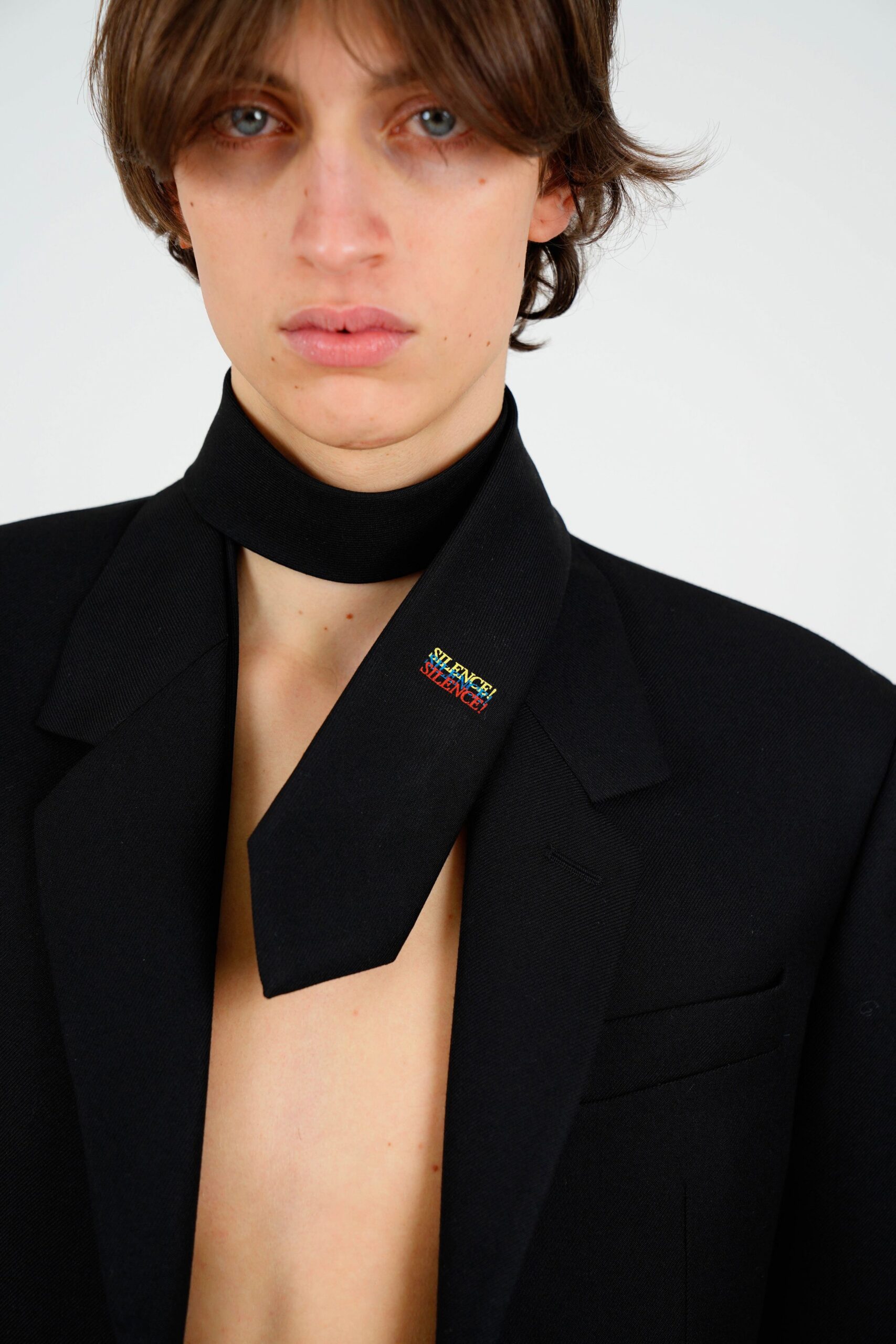 black structured blazer with scarf