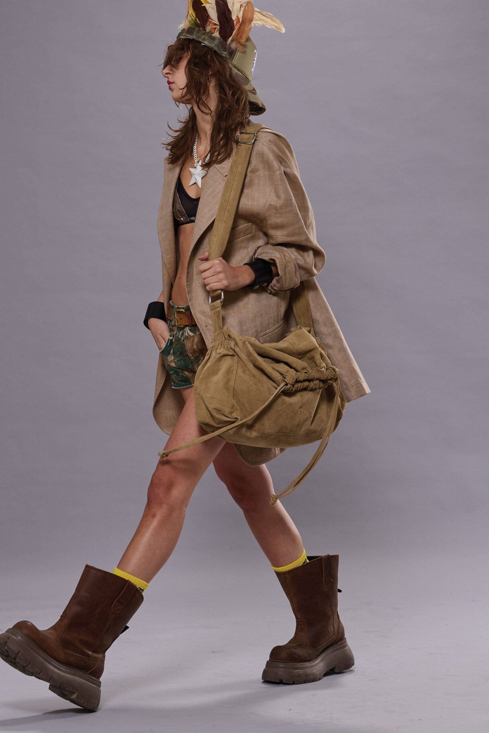 beige blazer black bikini green shorts