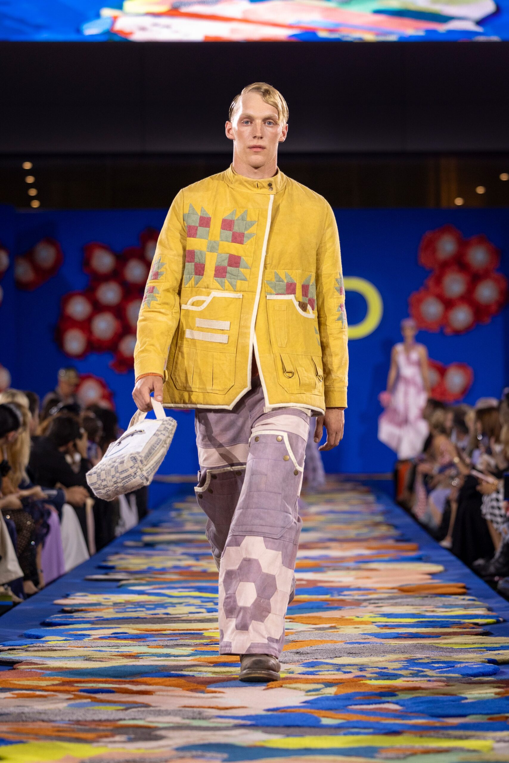 yellow embroidered jacket with purple cargo pants