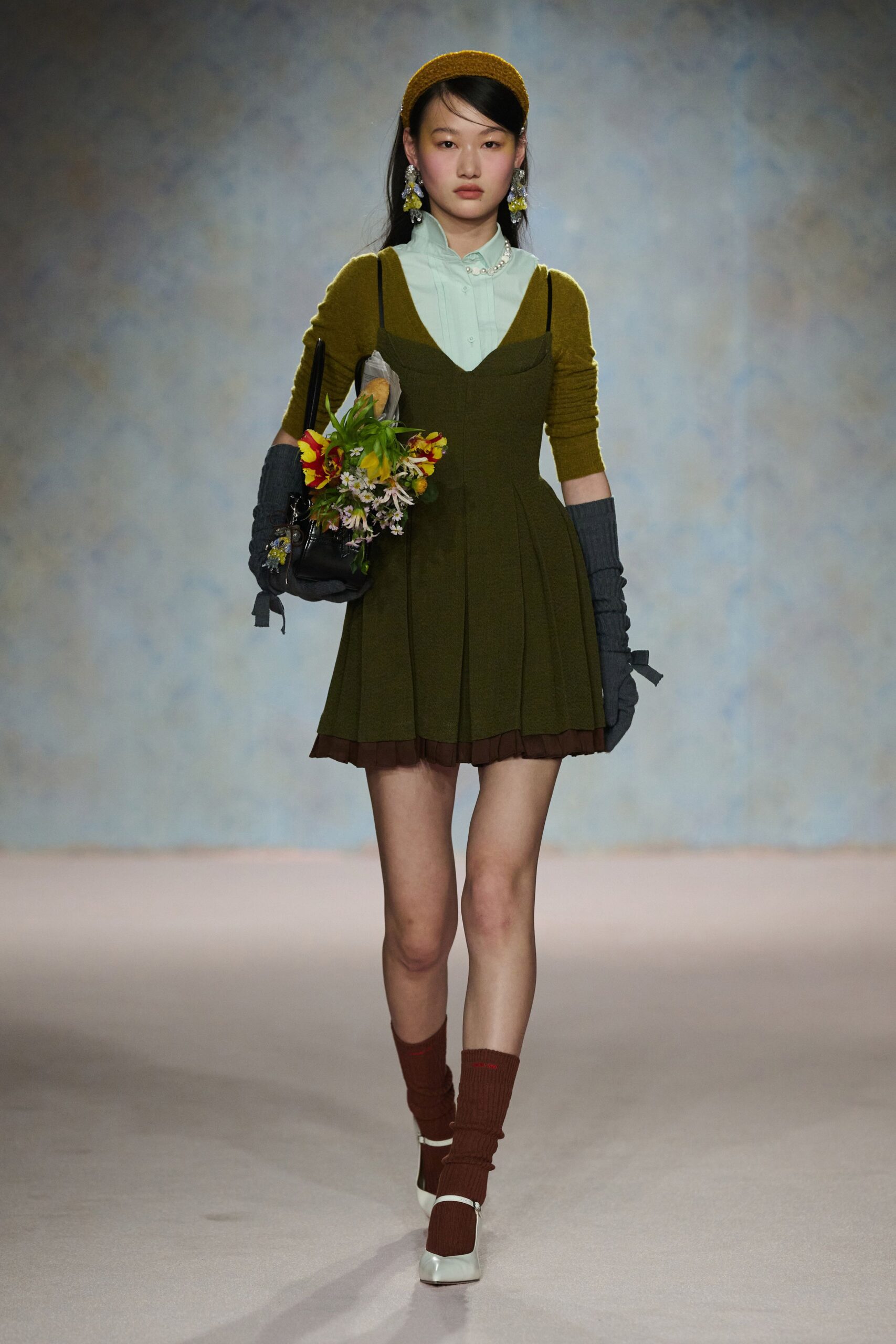 green cotton sleeveless v-neck fitted pleated mini dress