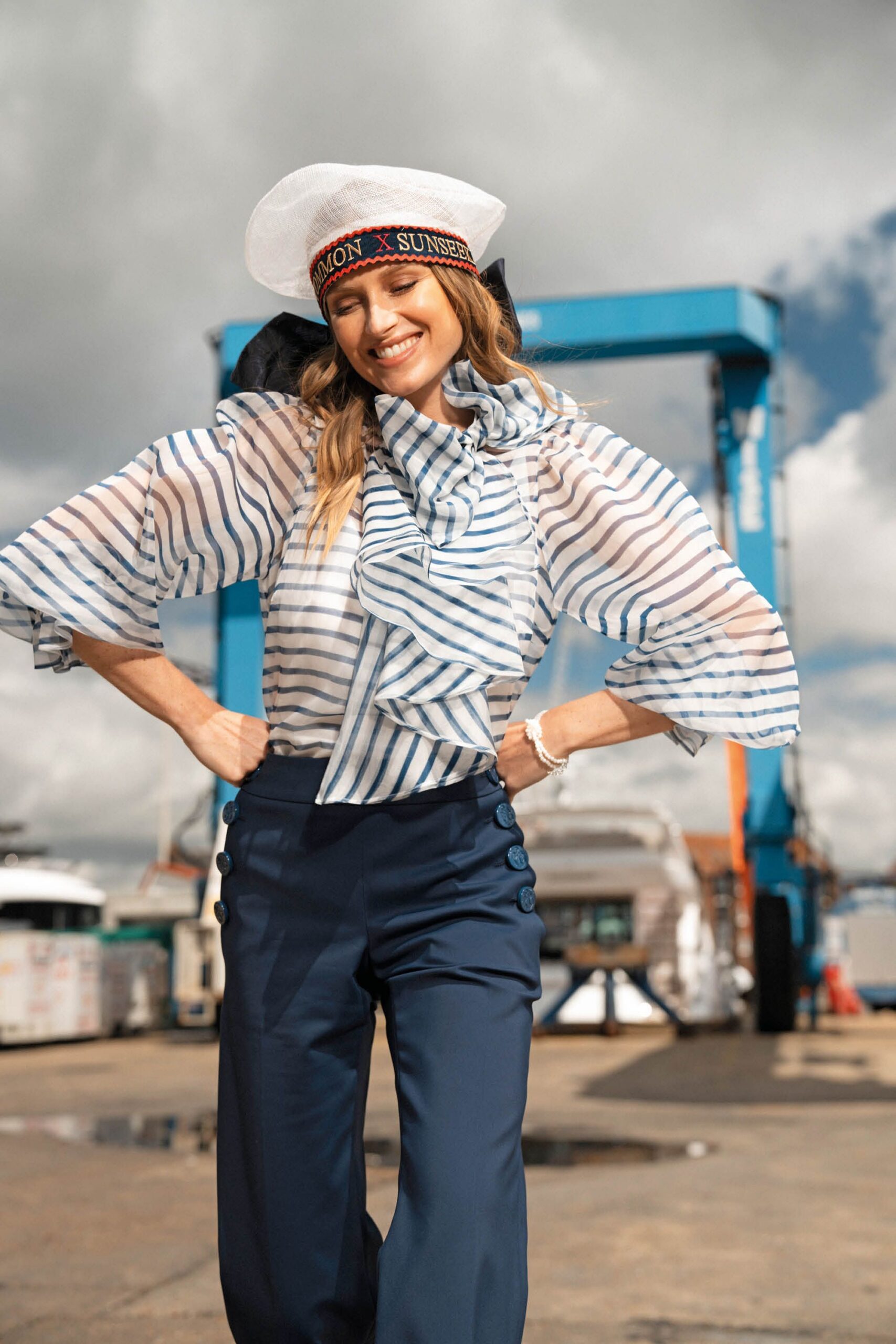 striped blouse and tailored pants