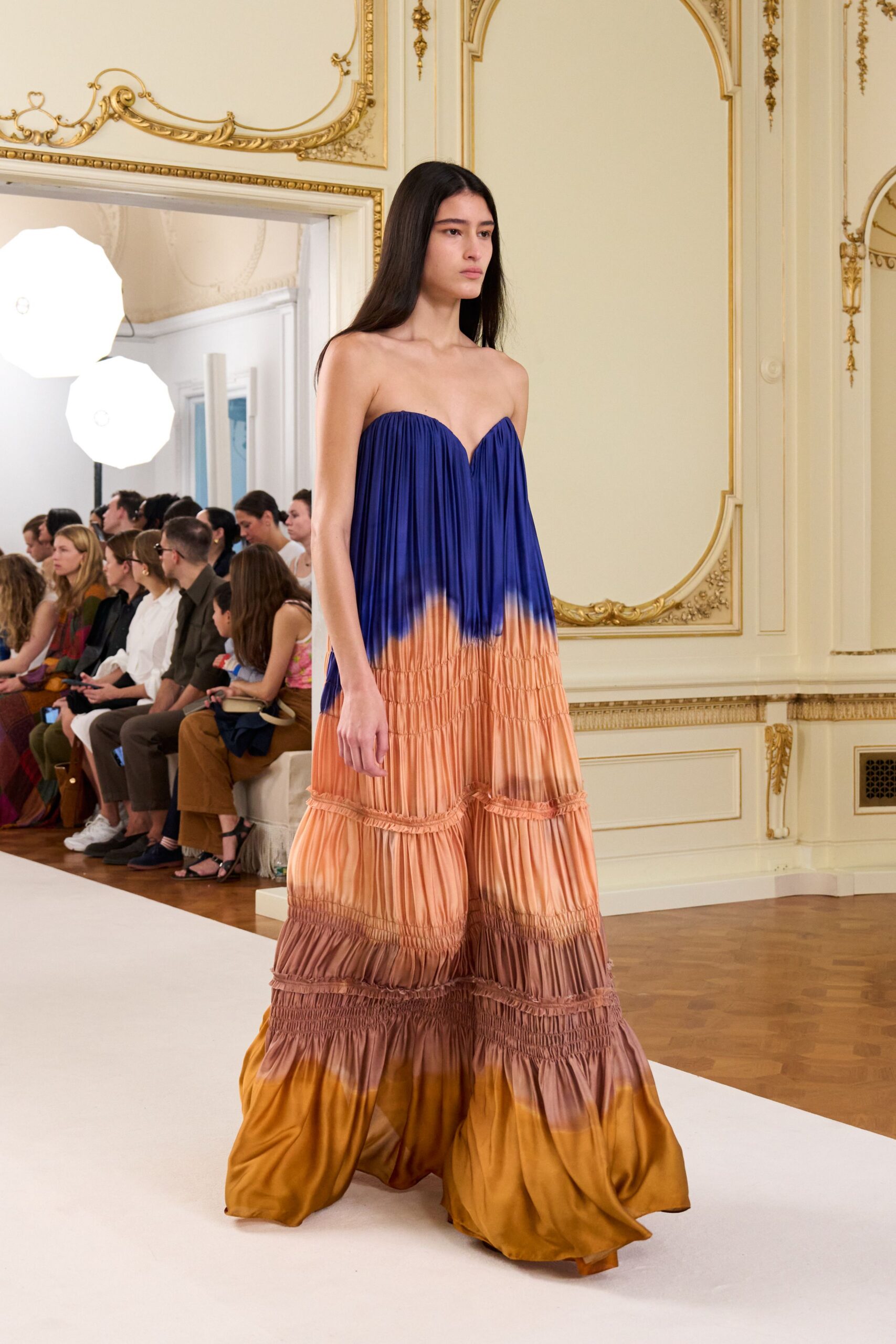 blue and orange pleated gown