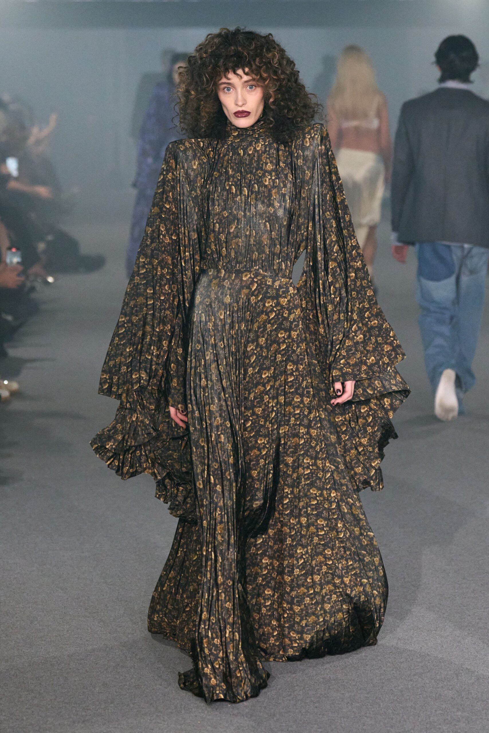 black and gold pleated gown