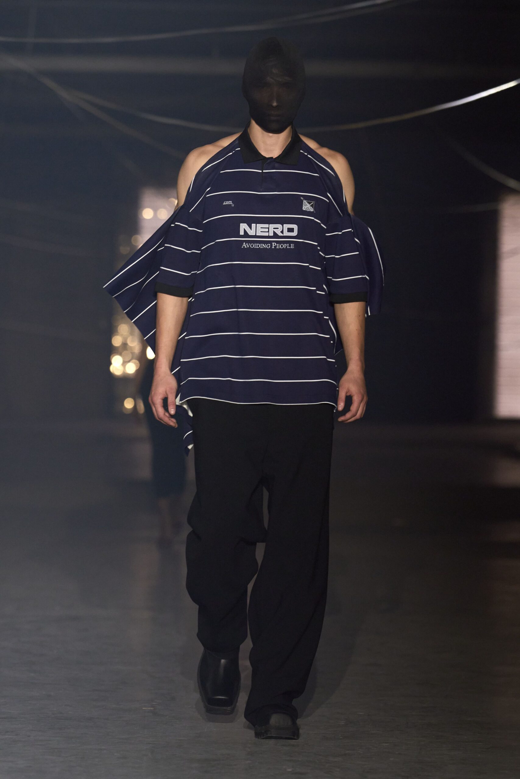 blue striped shirt with black pants