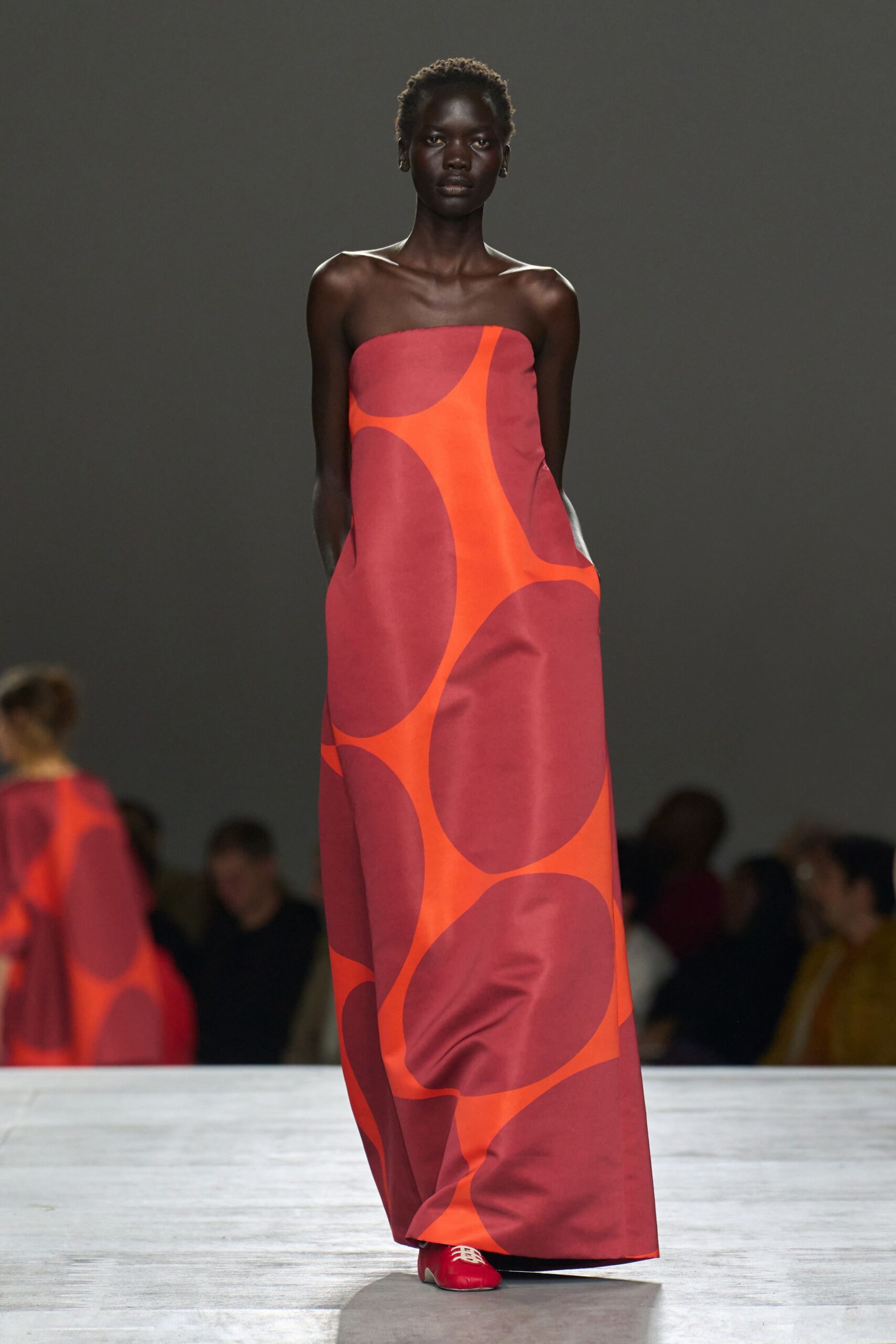 red cotton strapless fitted printed maxi gown