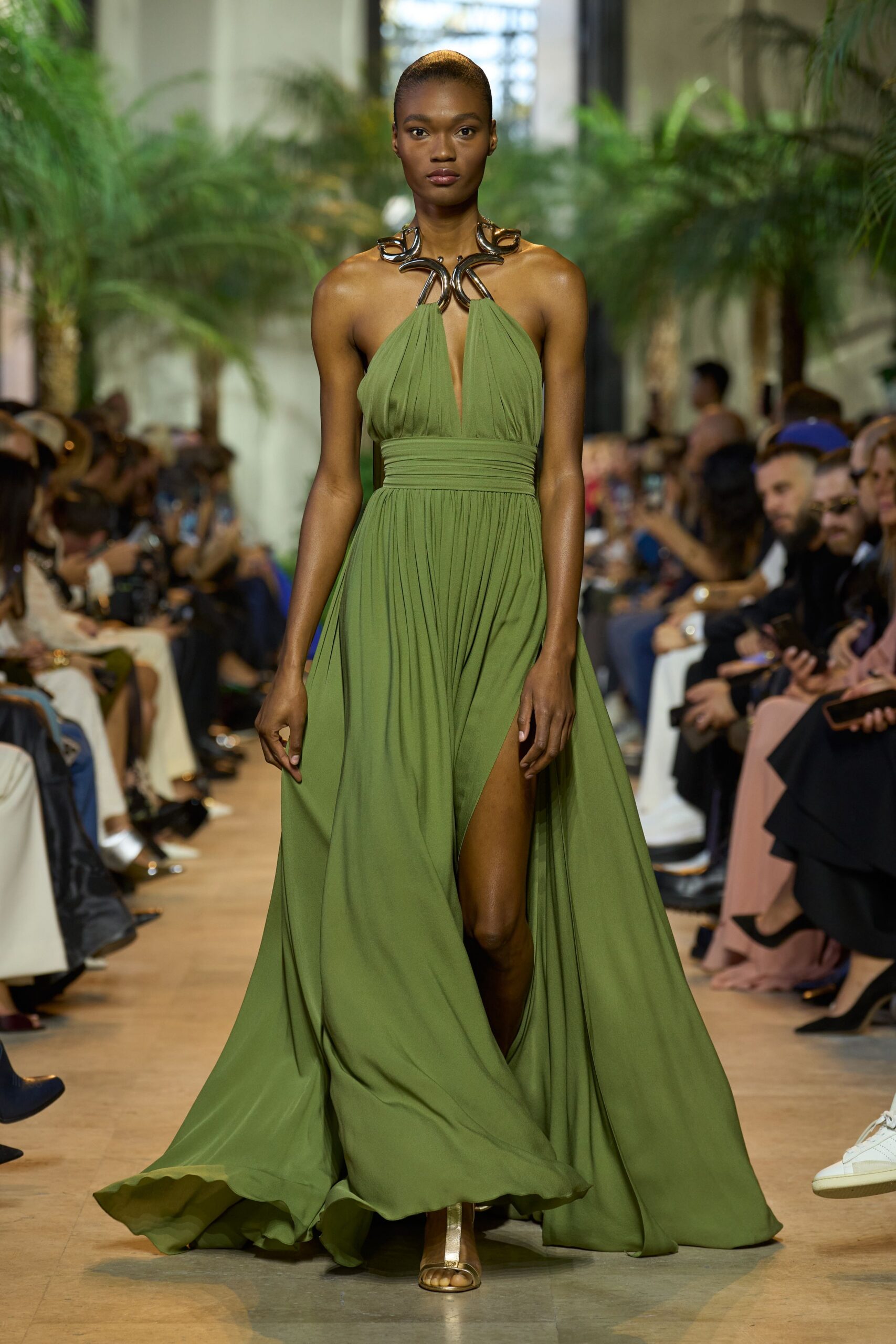 green silk sleeveless v-neck fitted draped flowing gown
