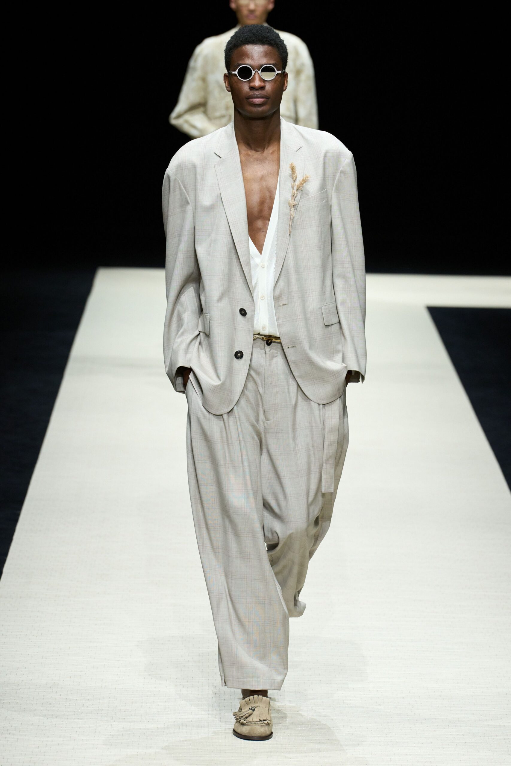 beige relaxed suit with white shirt