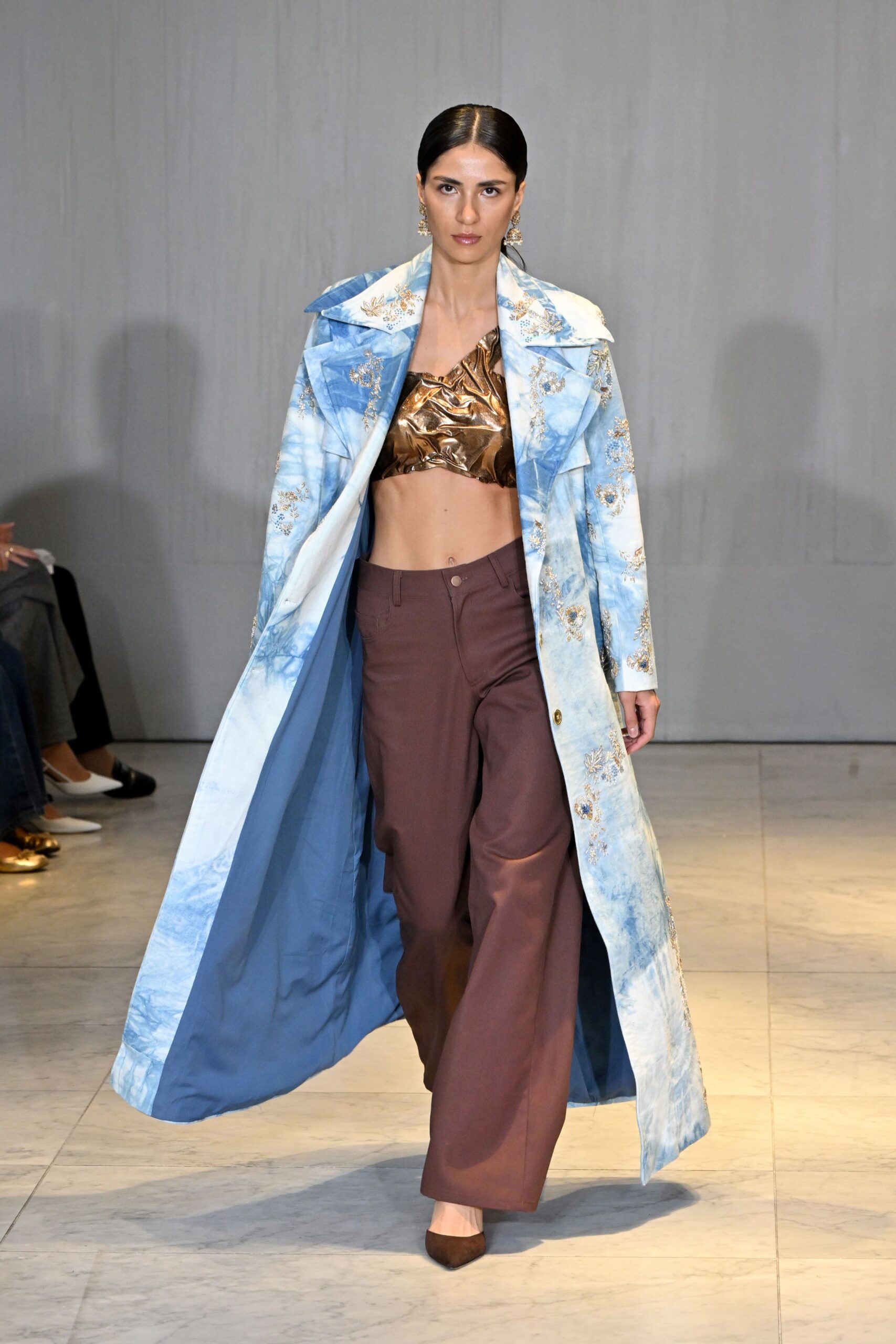blue embroidered coat with brown top