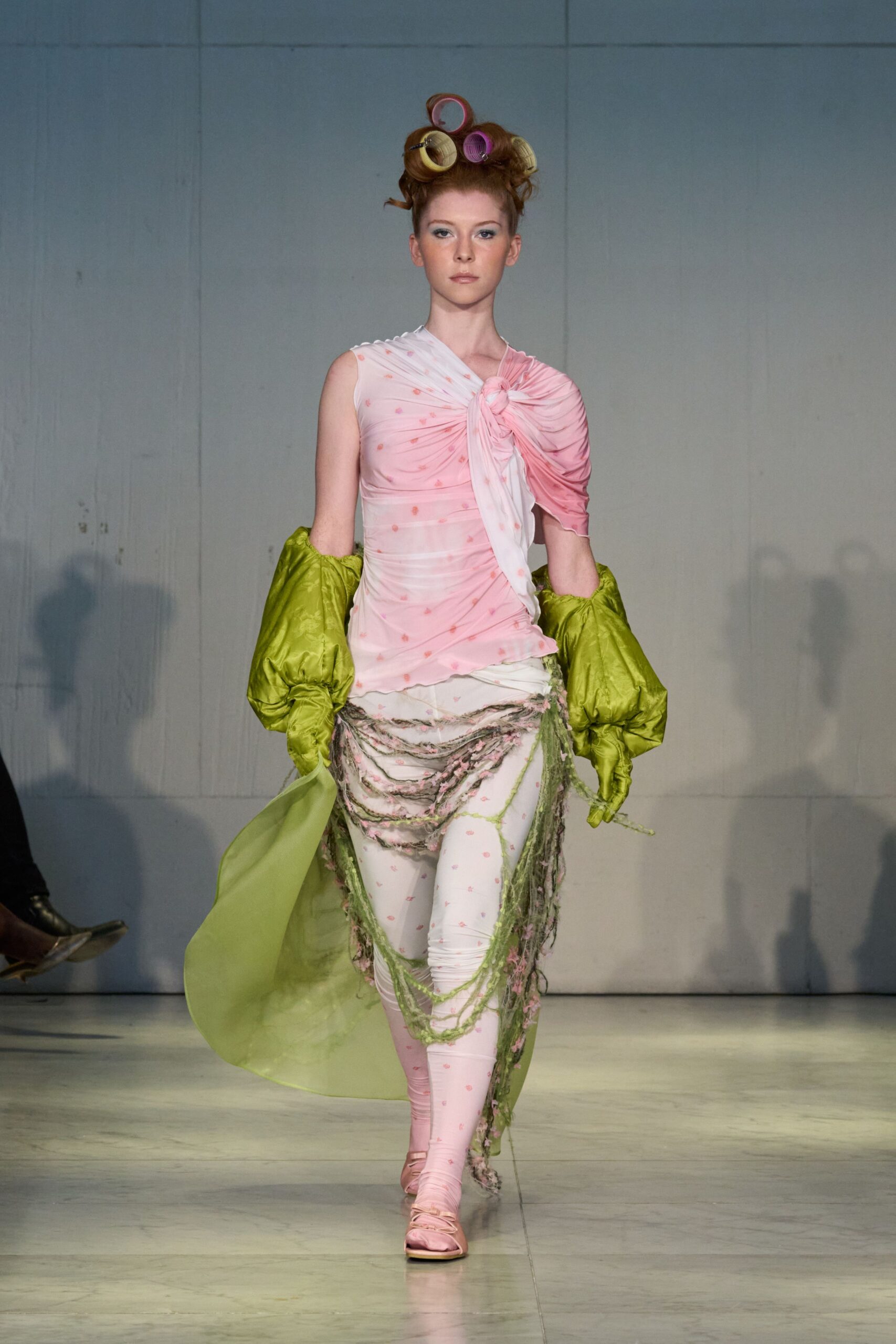 pink and white fitted top with gloves